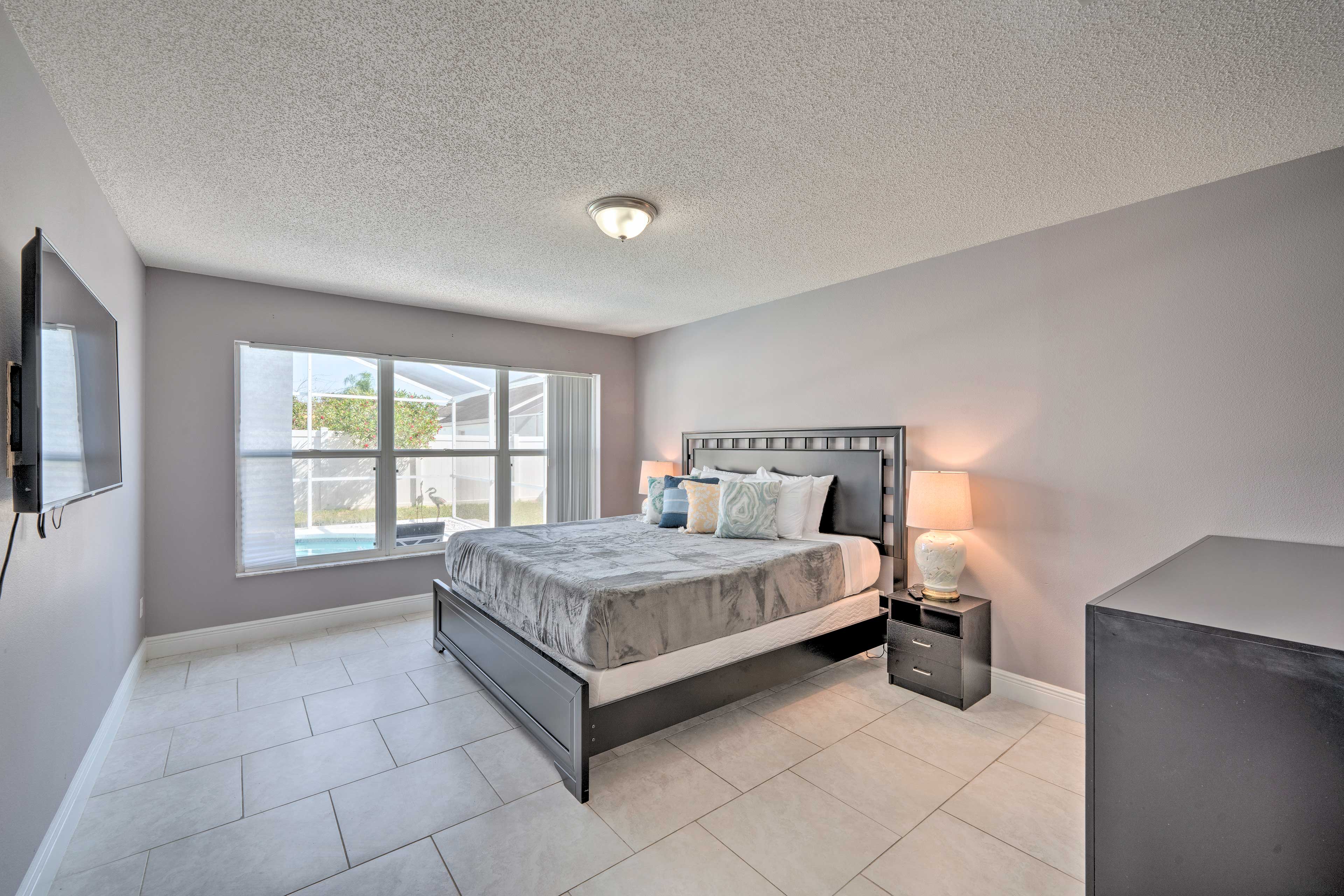 Bedroom 1 | 1st Floor | King Bed | Linens Provided | Smart TV | Pool Views