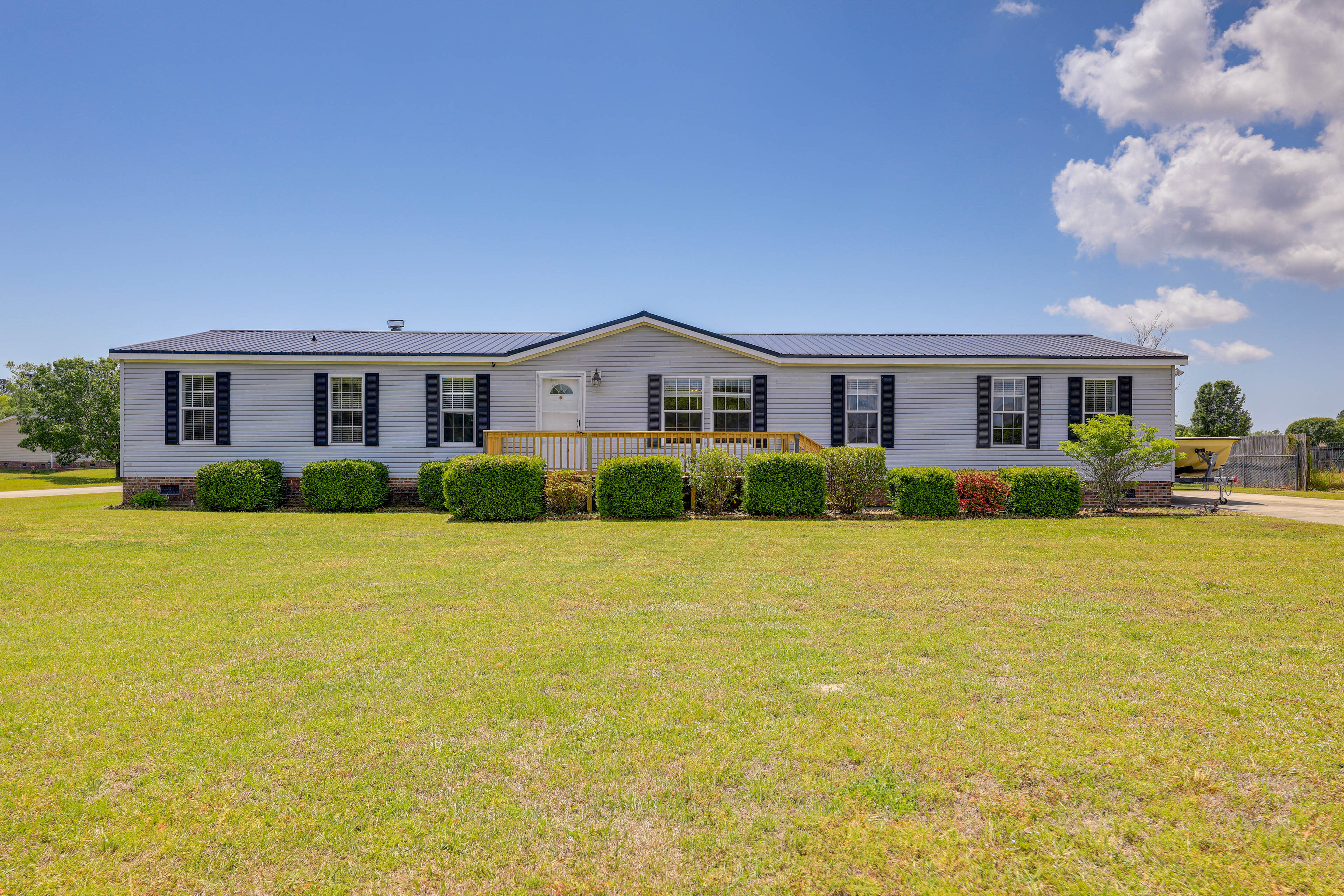 Exterior | Spacious Front Yard | Backyard