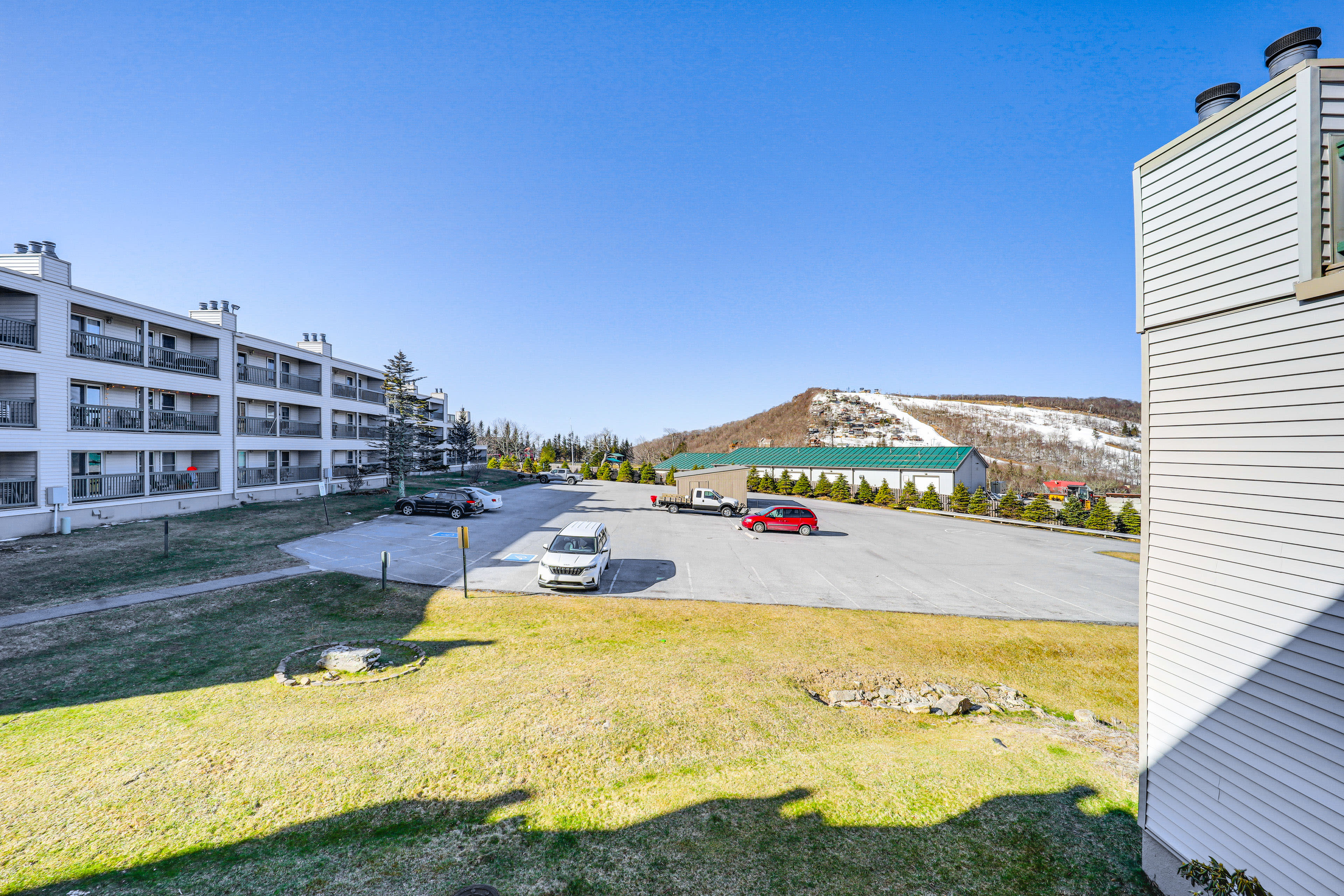 Balcony Views | Community Parking Lot (2 Vehicles, Open Parking)