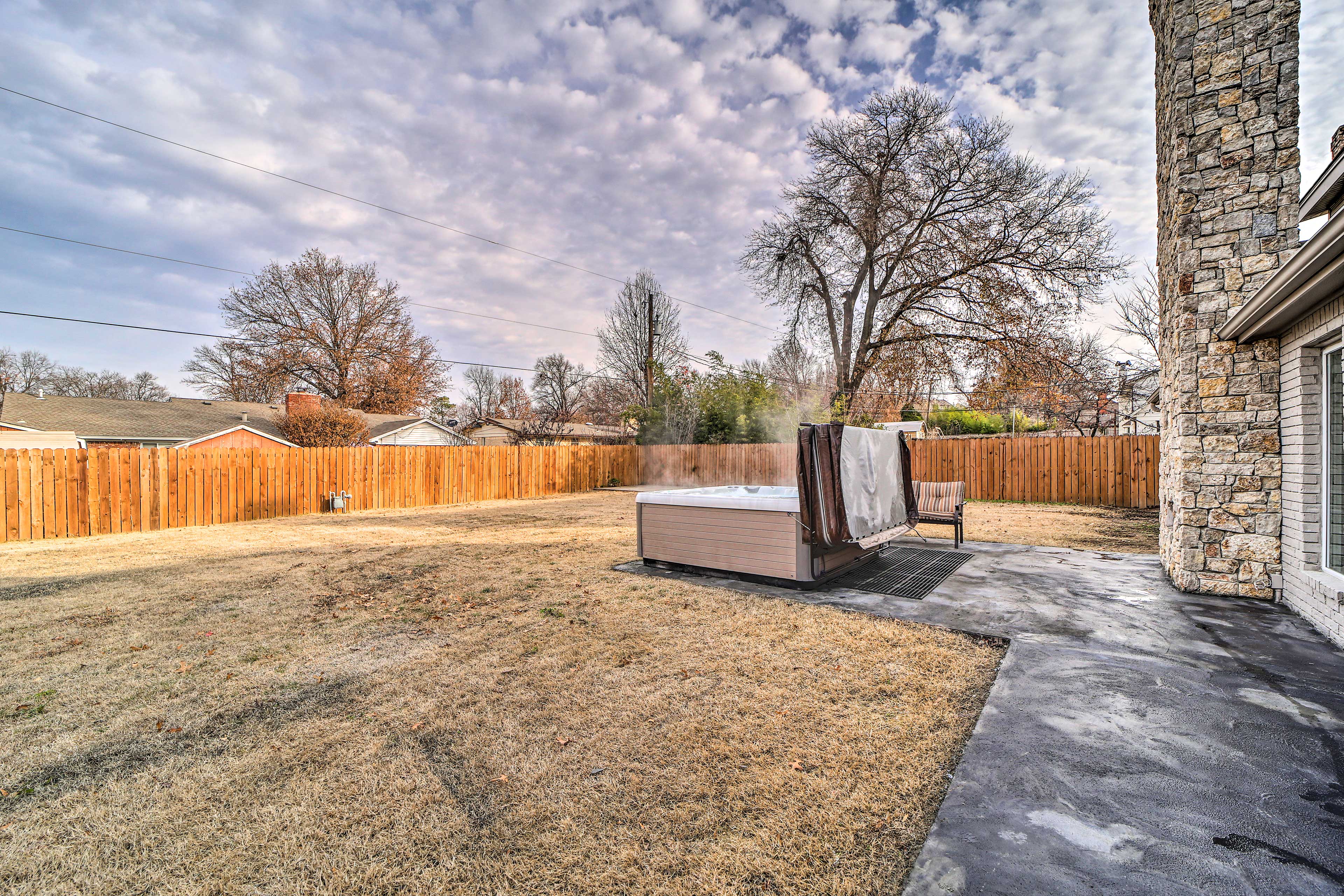 Fenced Backyard | Hot Tub | Outdoor Fireplace