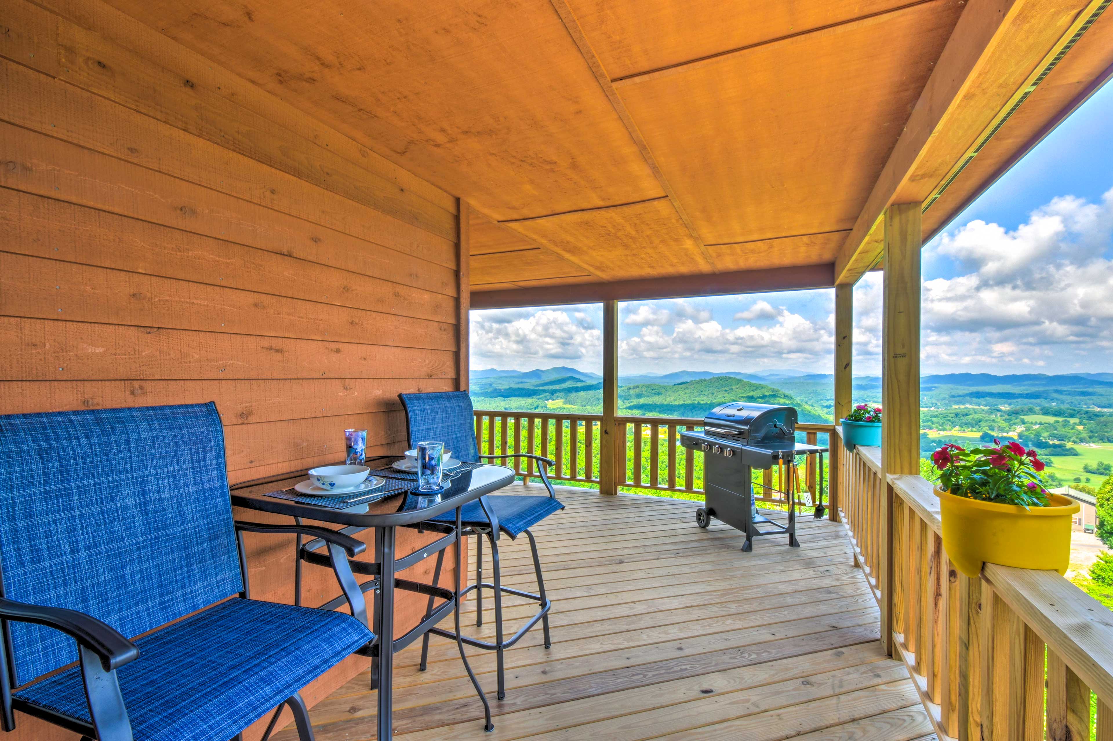 Cabin Exterior | Furnished Deck | Gas Grill | Mountain Views