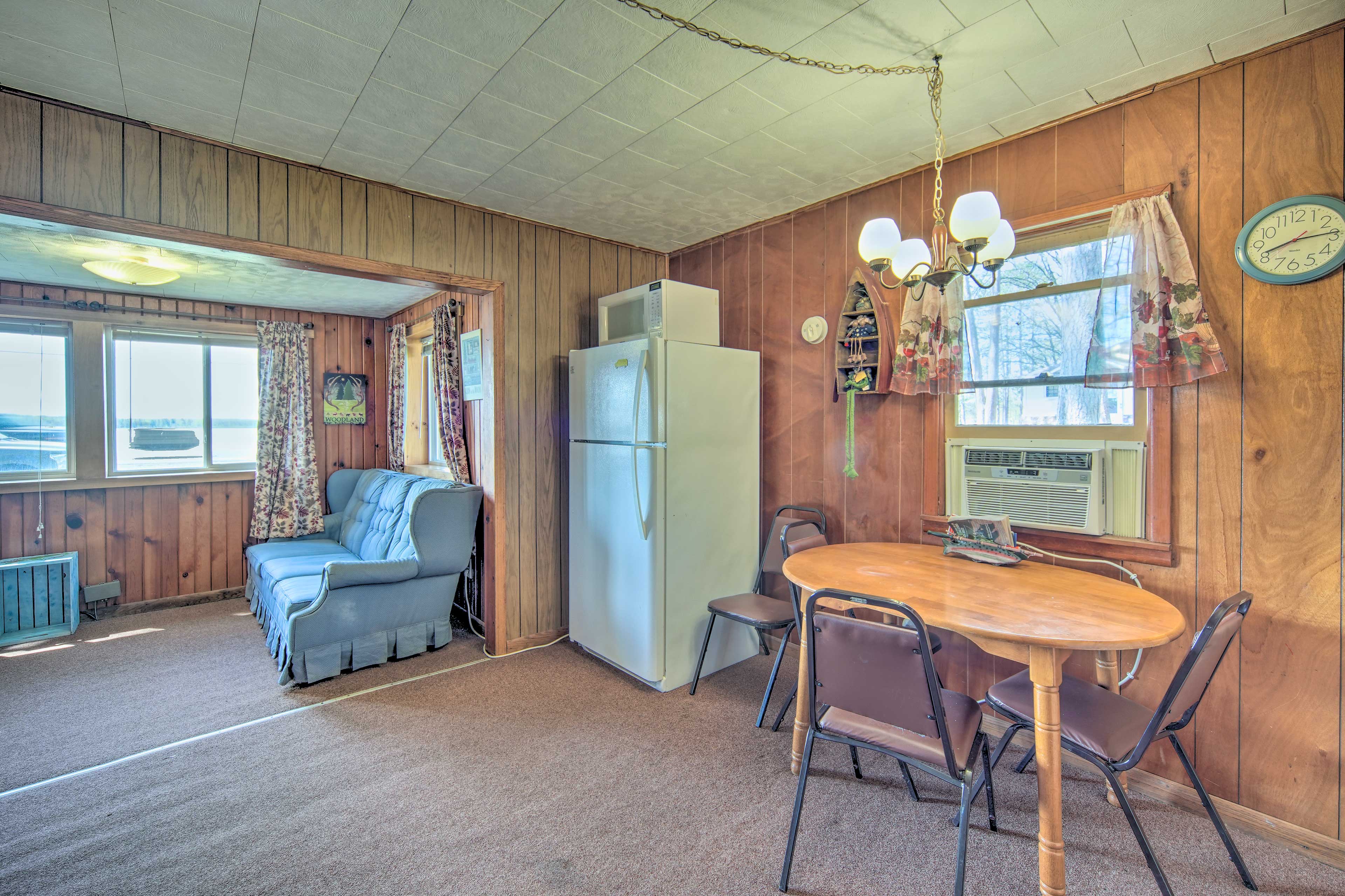 Dining Area | Dishware & Flatware | Window A/C Unit