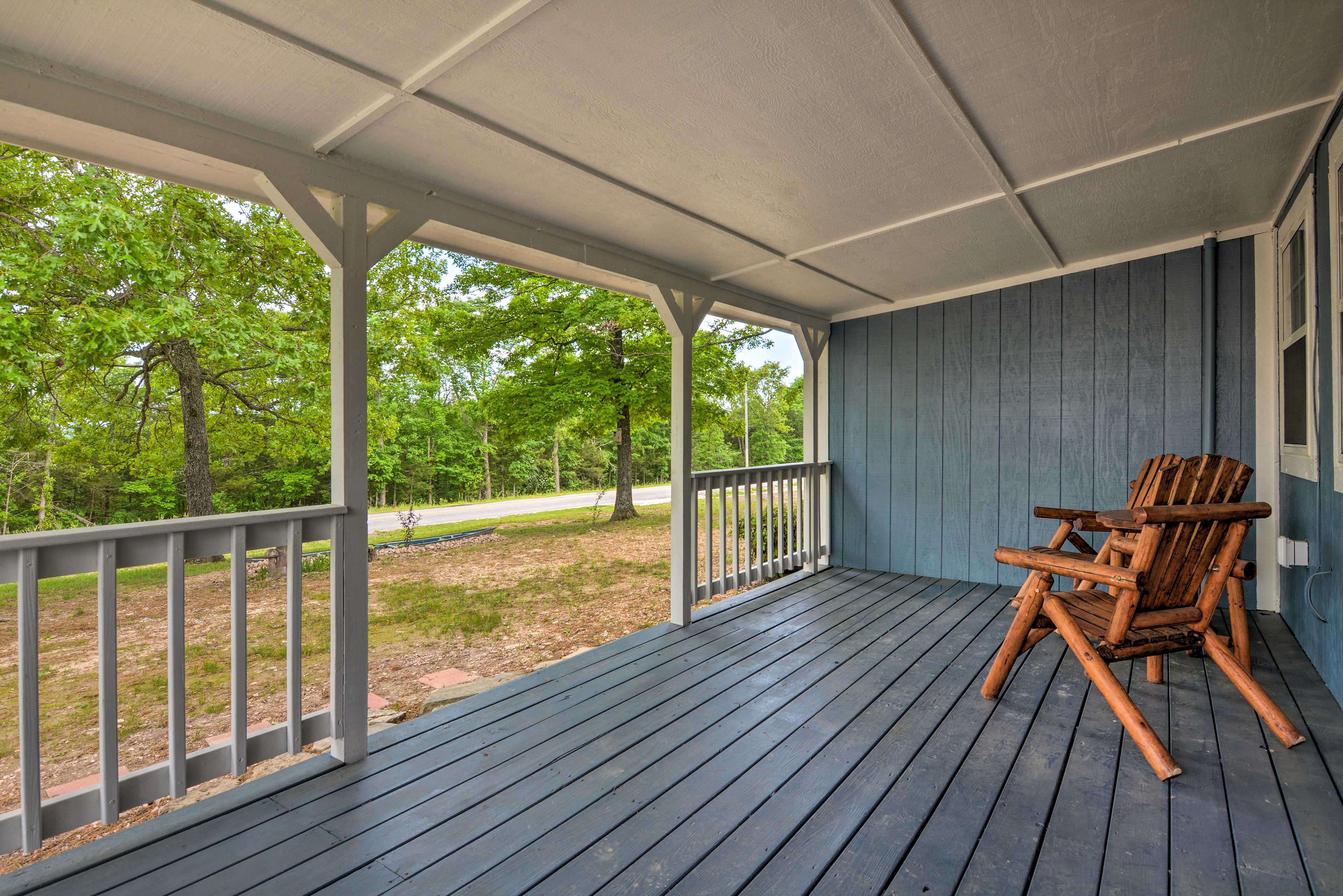 Covered Porch | Yard | Lake Access Nearby