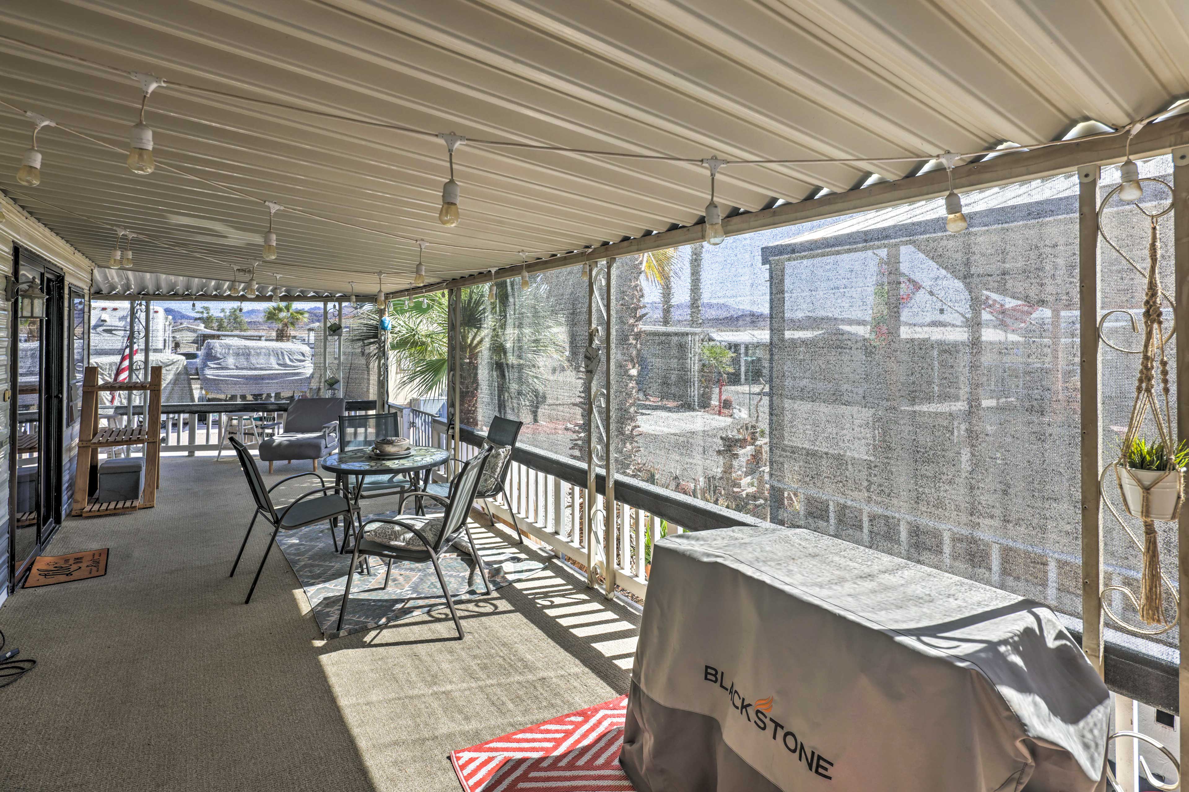 Screened-In Porch | Outdoor Dining Area | Grill