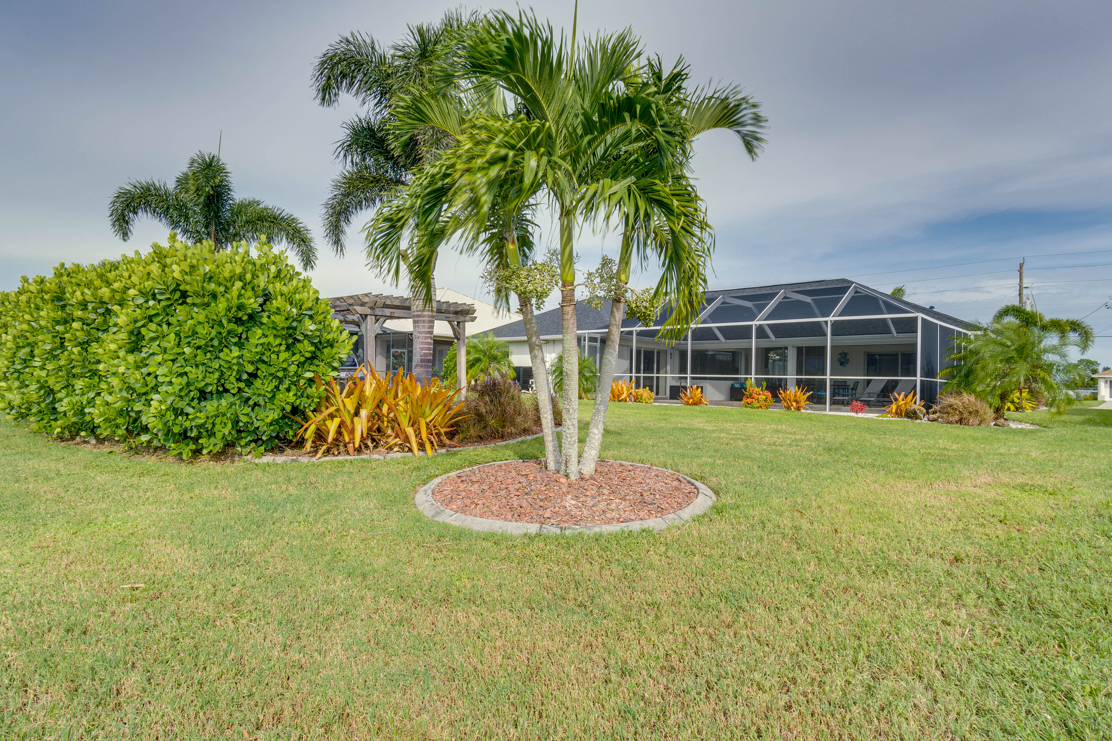 Private Backyard Area | Pergola | Gas Grill | Chiminea | Canal Views