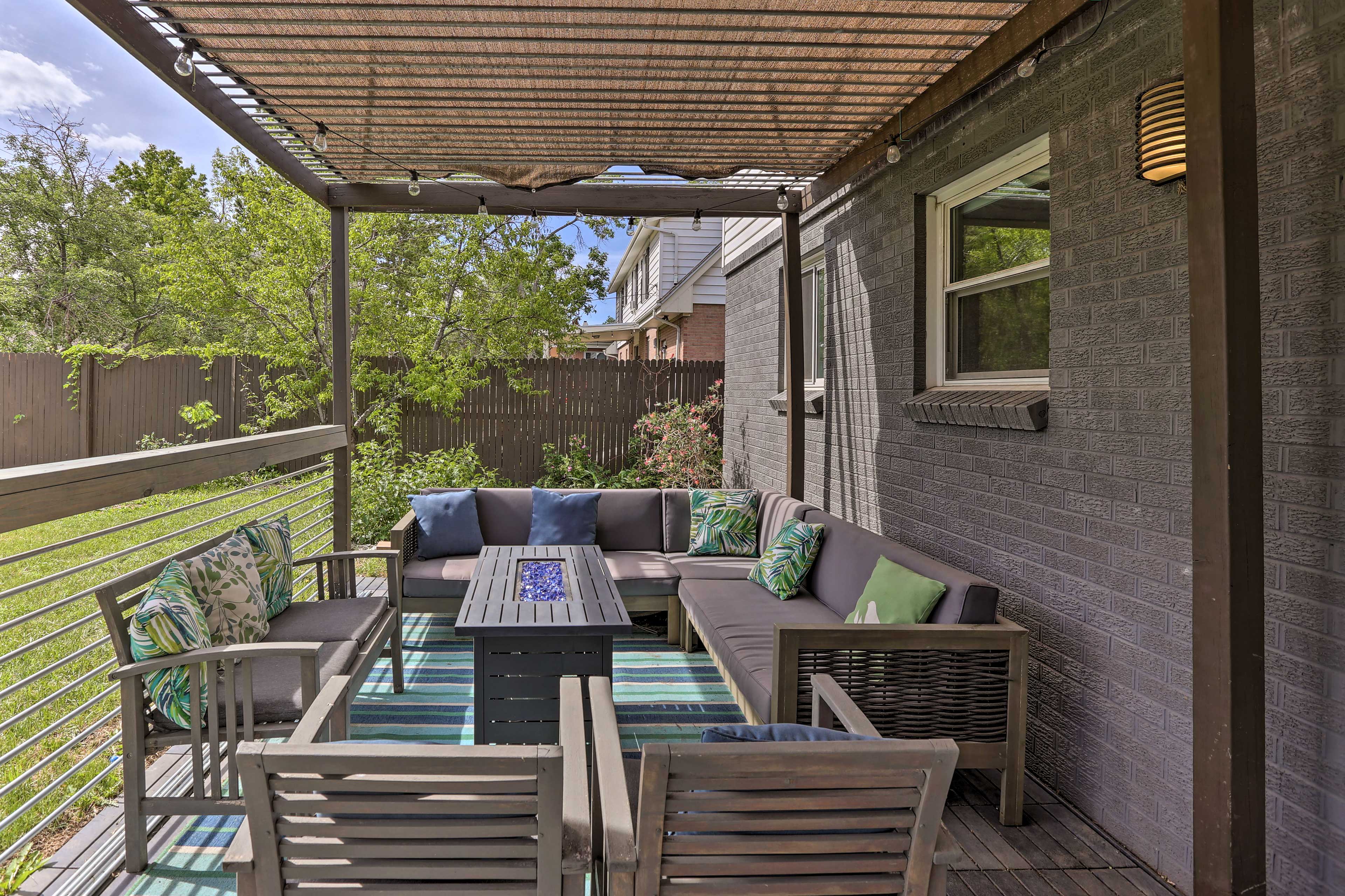 Shaded Patio | Cushioned Seating | Gas Grill | Backyard | Fire Pit