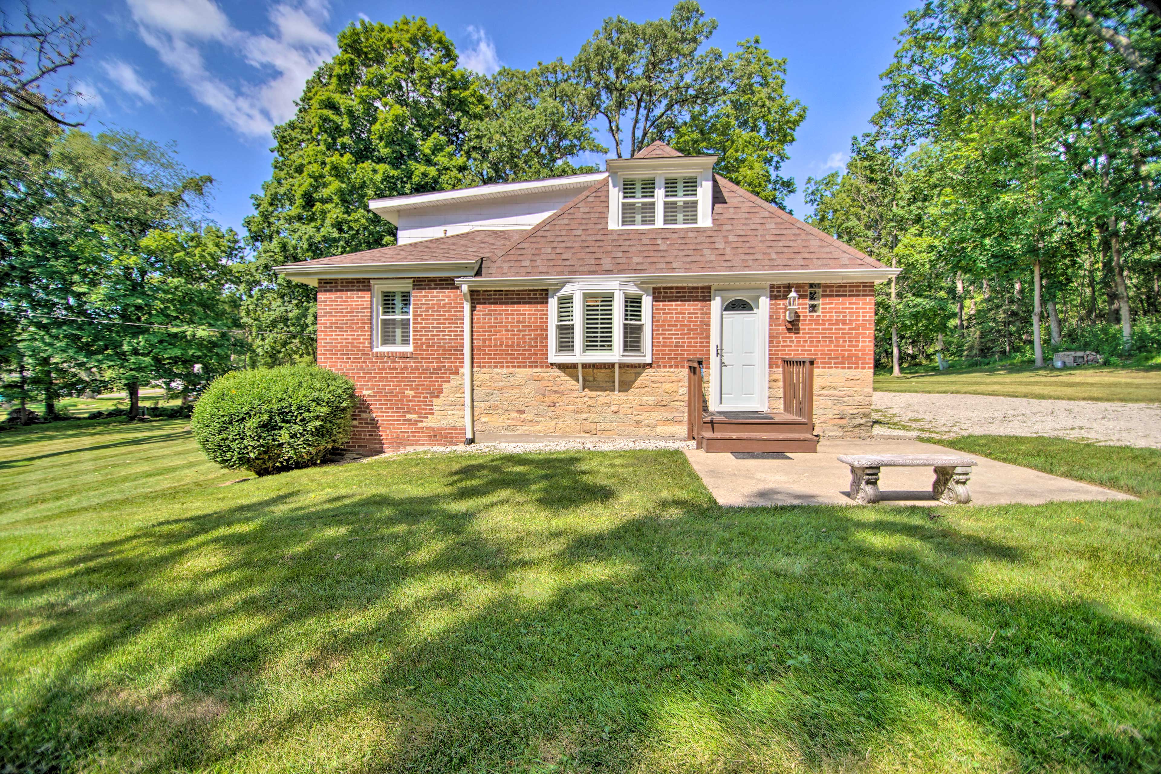 Front Exterior | Lush, Peaceful Setting | ~2 Mi to Lake Como Public Access