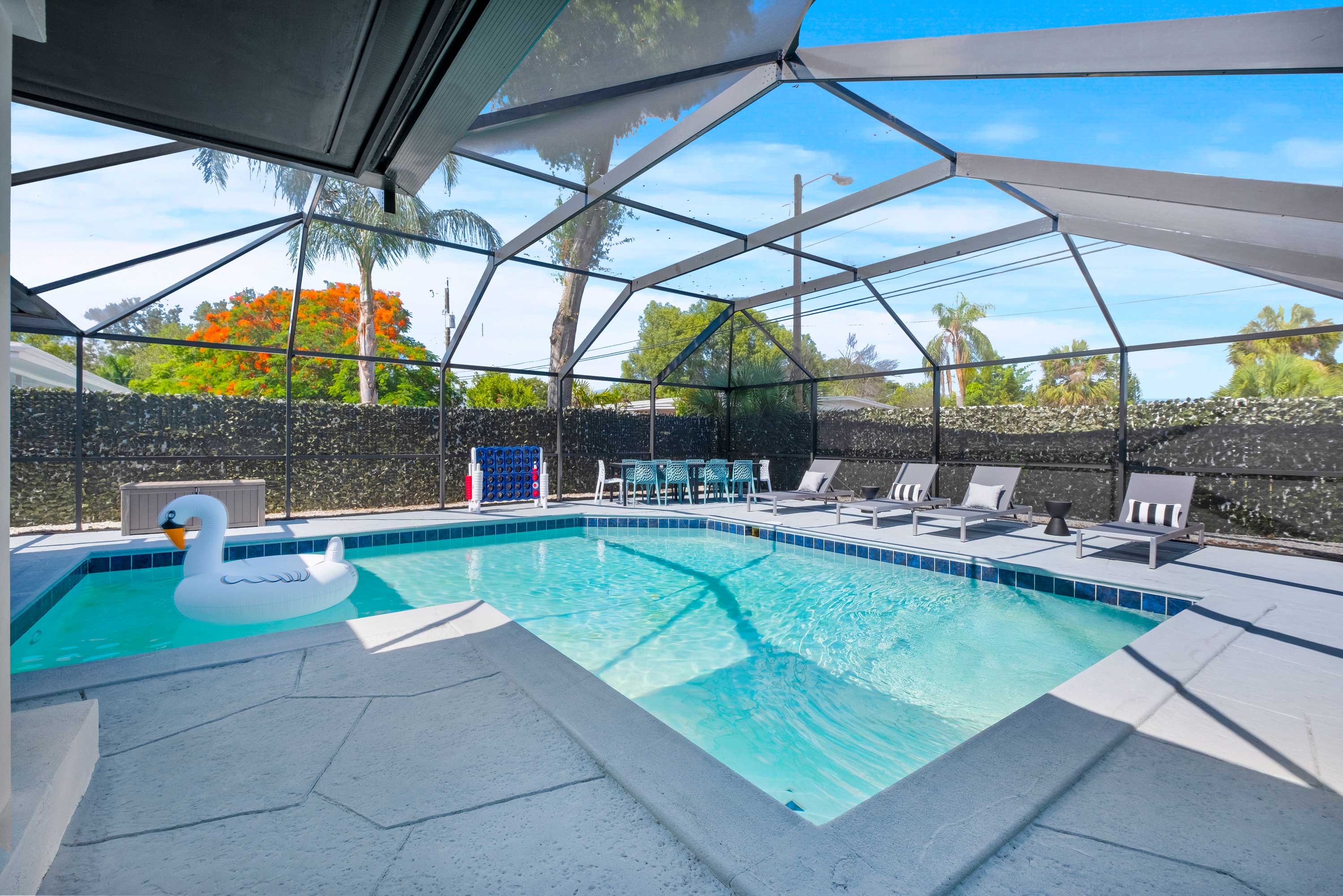 Lanai | Outdoor Dining Area | Lounge Chairs | Beach Towels