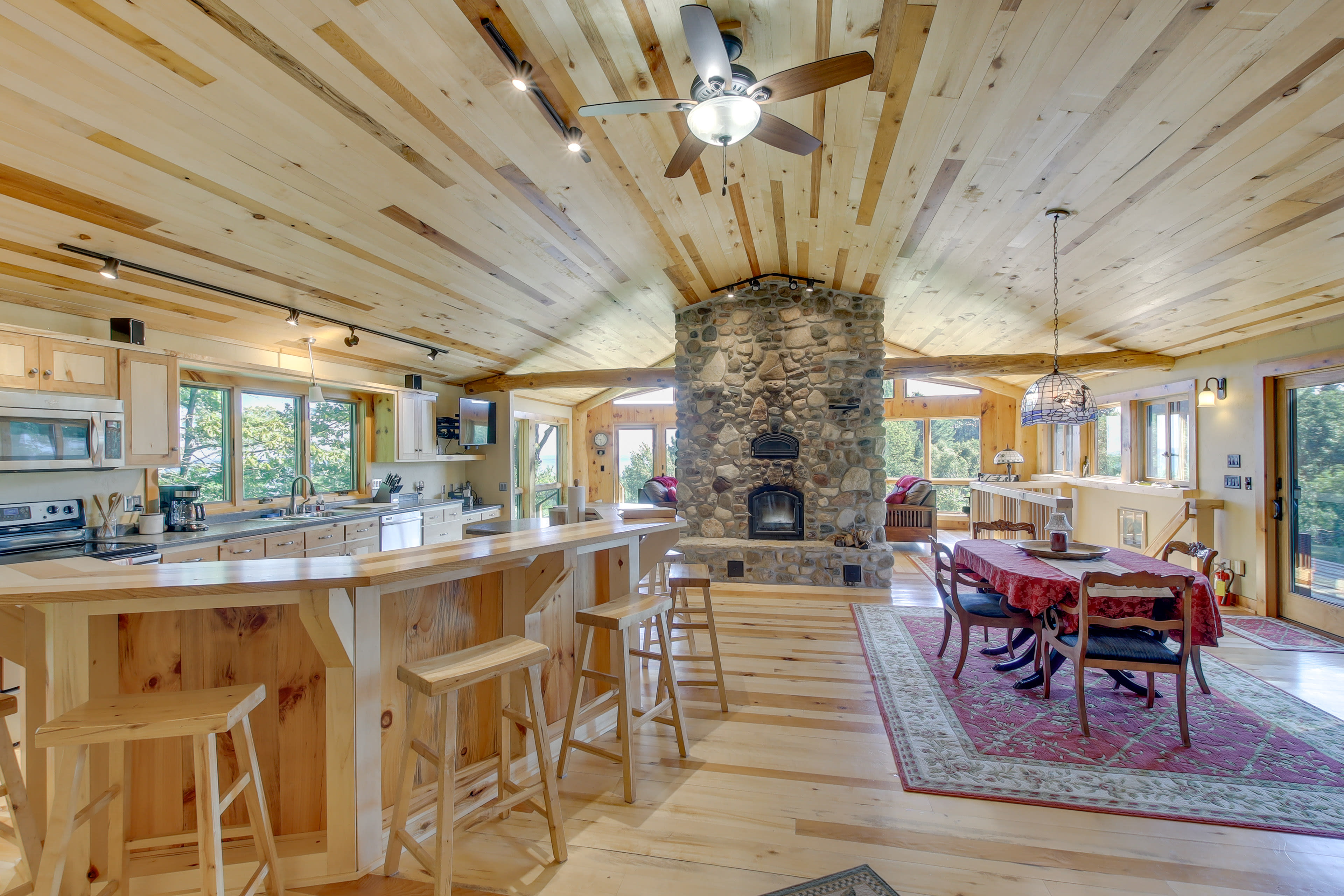 Dining Area | Double-Sided Fireplace | Wet Bar | Dishware & Flatware Provided