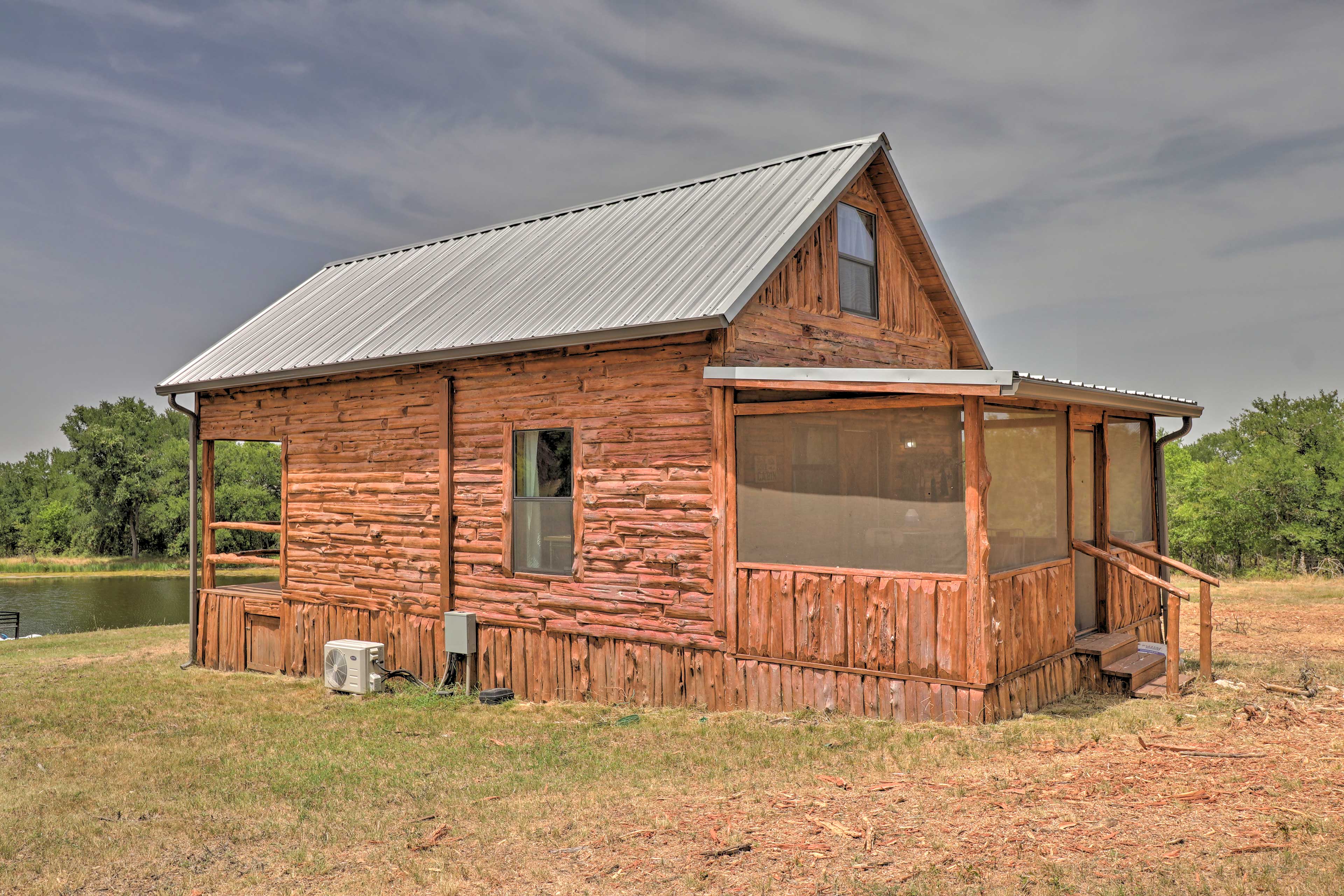 Cabin Exterior | Grass Driveway Parking (4 Vehicles) | RV/Trailer Parking