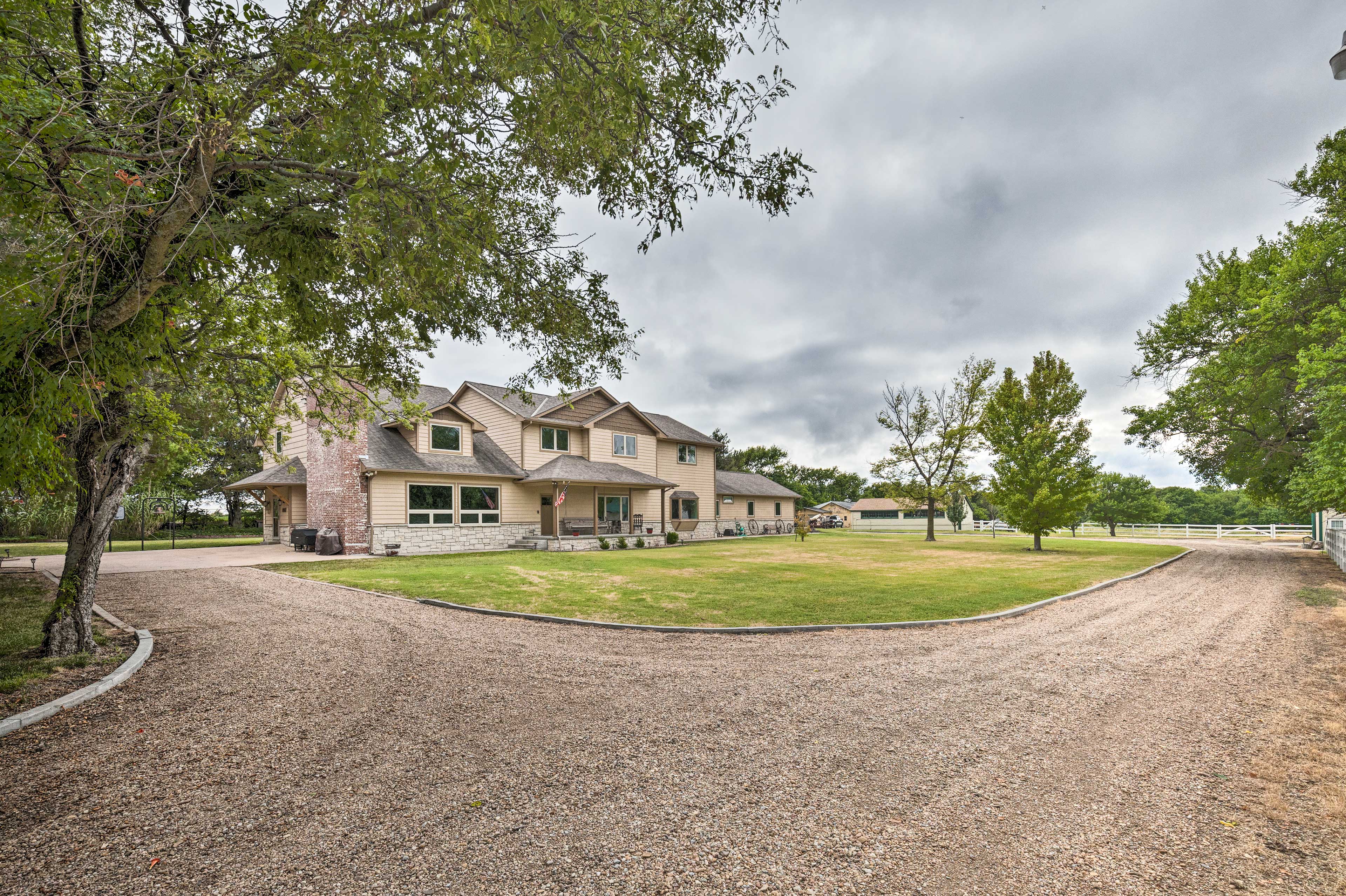 Entrance | Gravel Driveway Parking (6 vehicles) | Garage Parking (2 vehicles)