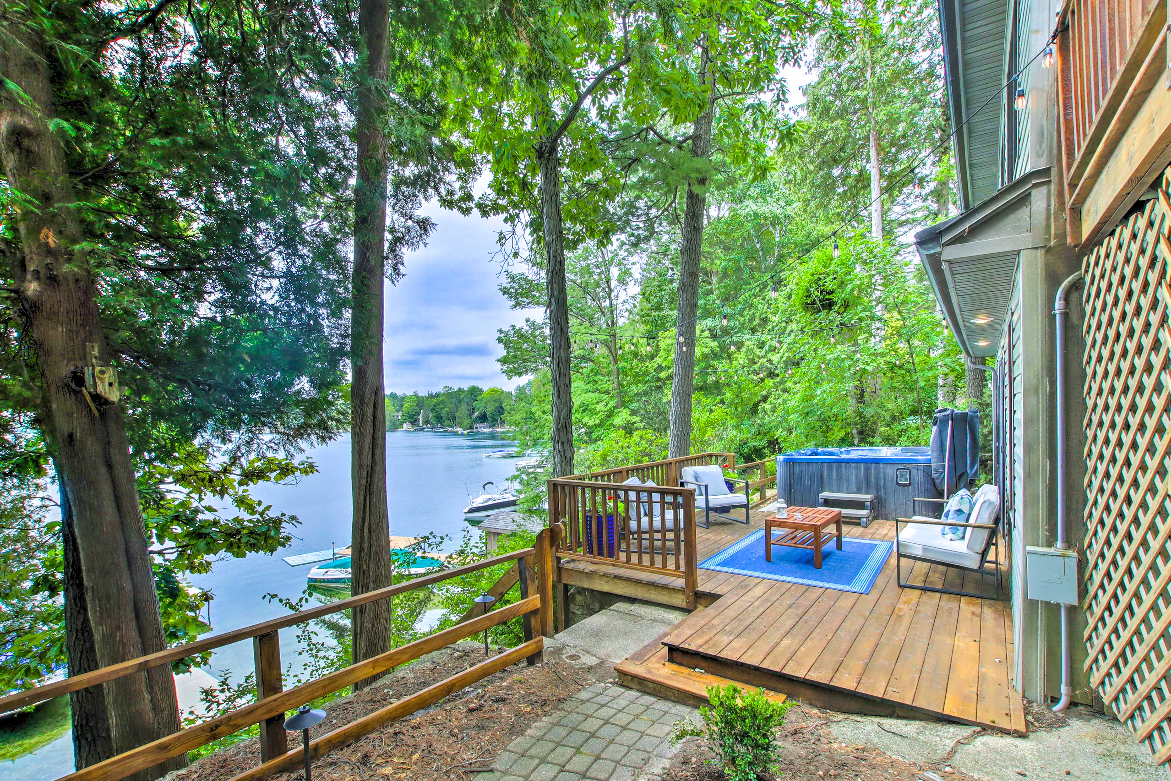 Cottage Exterior | Lower Furnished Deck | Private Hot Tub