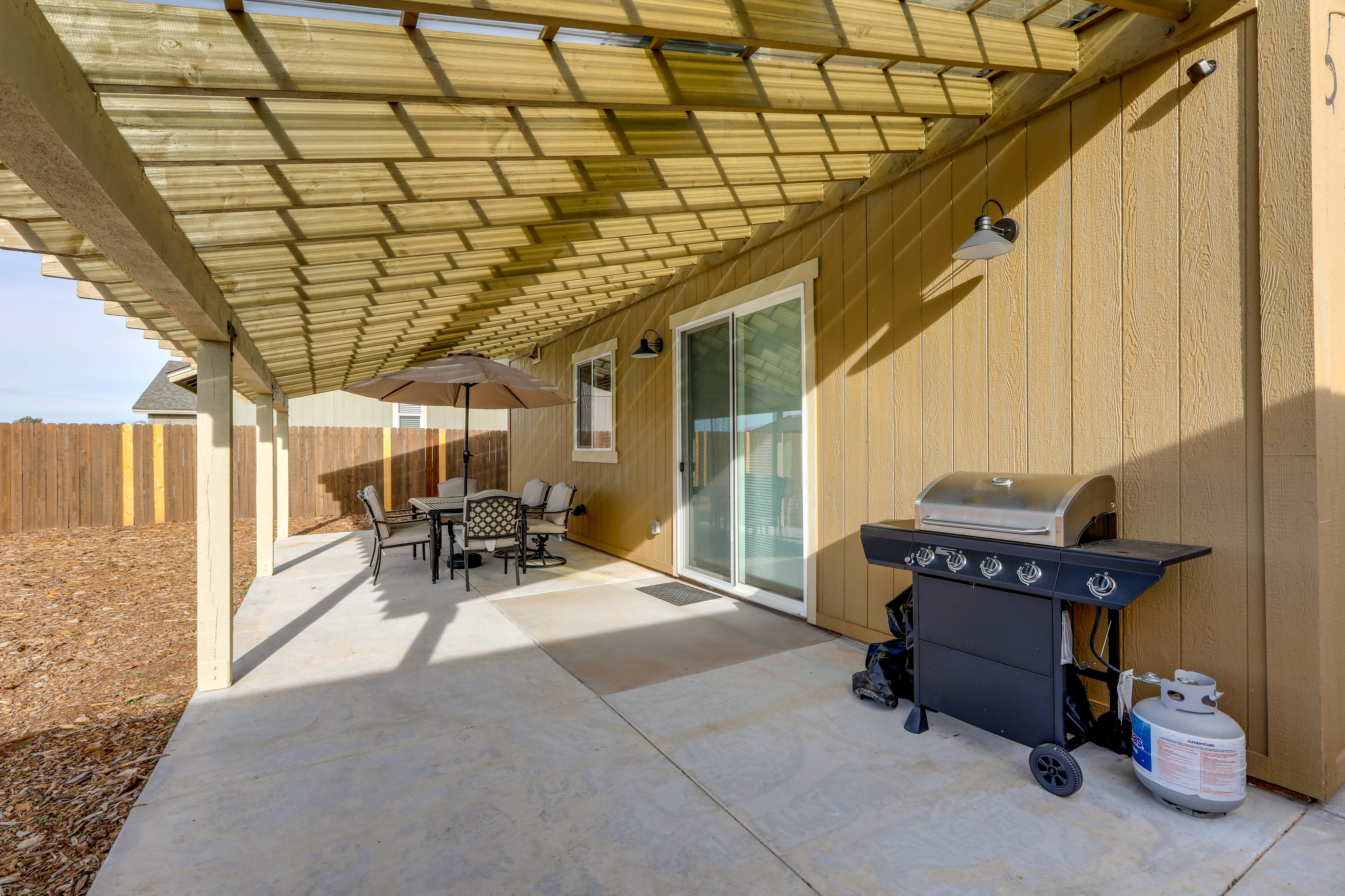 Covered Back Patio | Gas Grill | Fenced Backyard