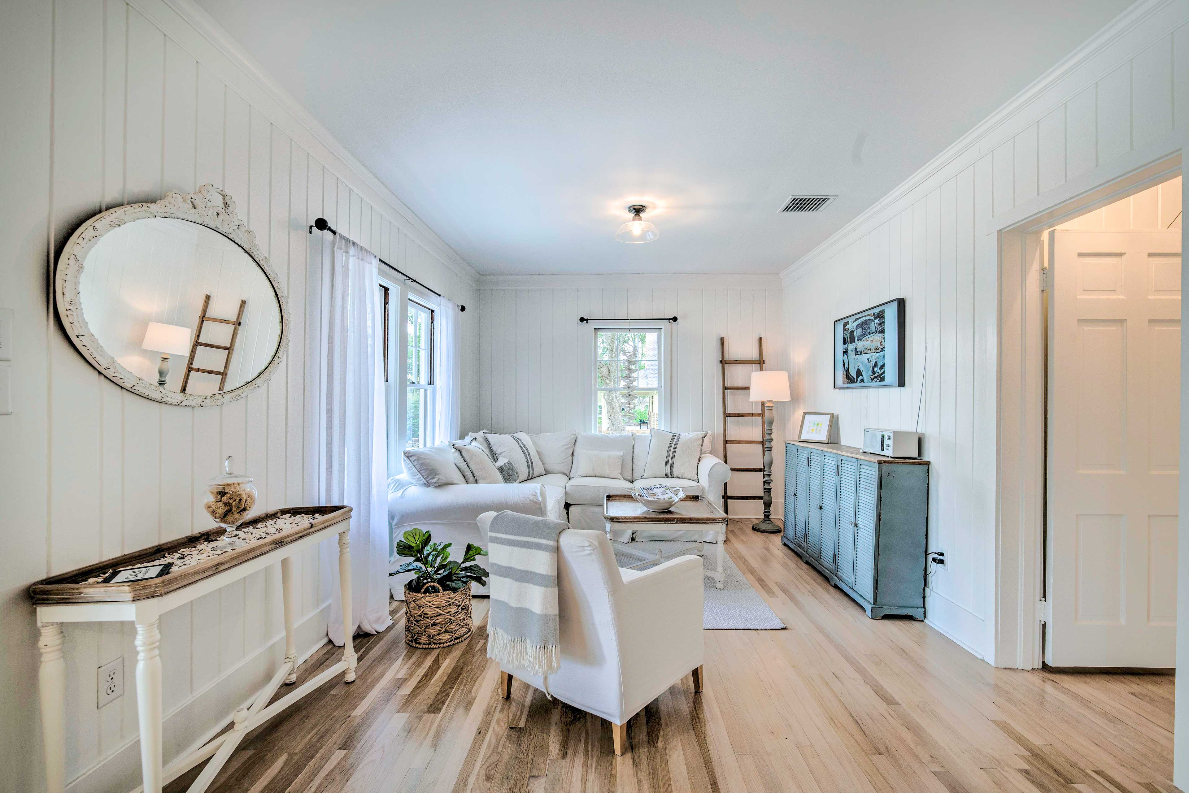 Living Room | Main Level | Central A/C + Heating | Wood-Burning Fireplace