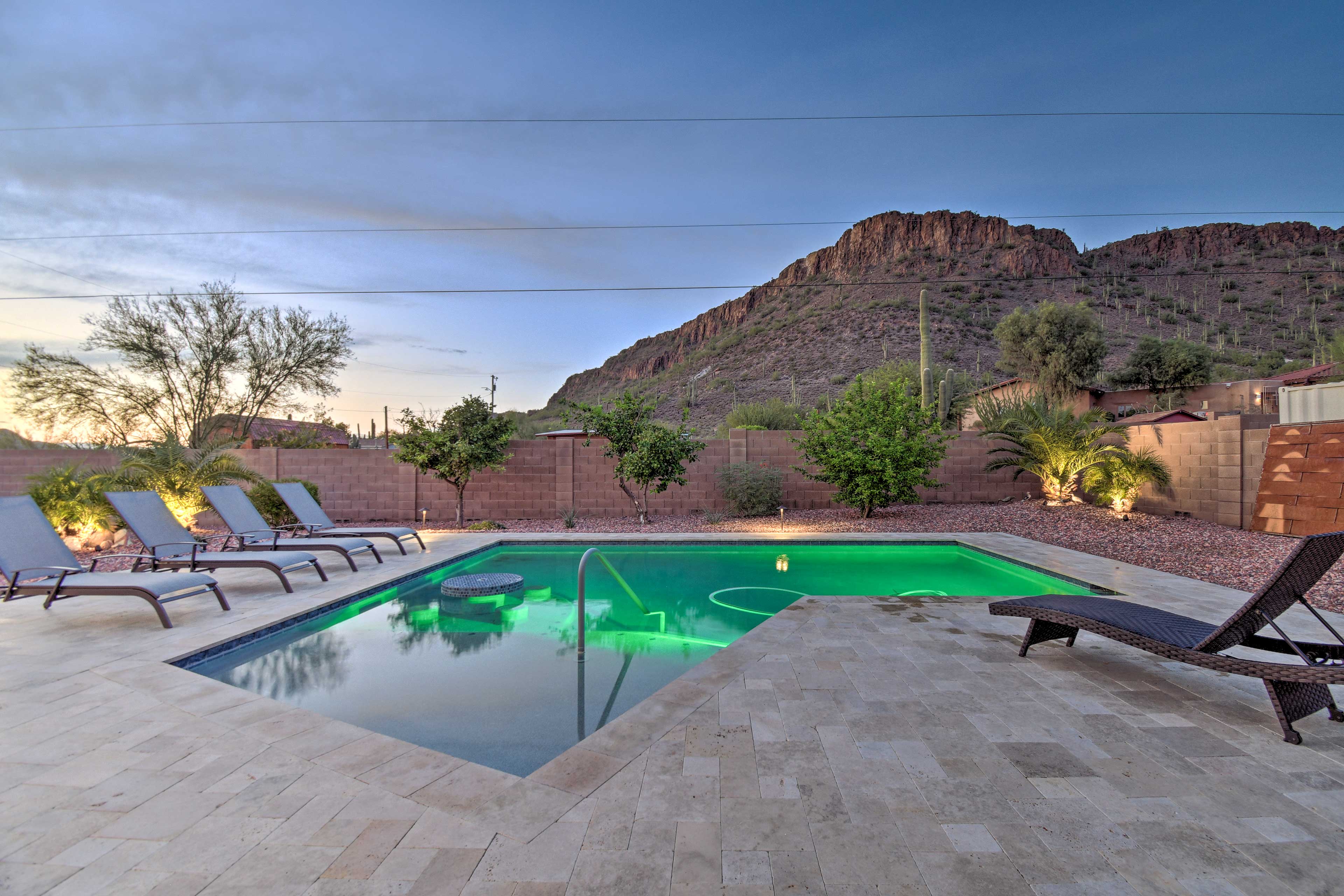 Pool Area | Outdoor Seating & Dining | Sun Umbrella | Butte Views