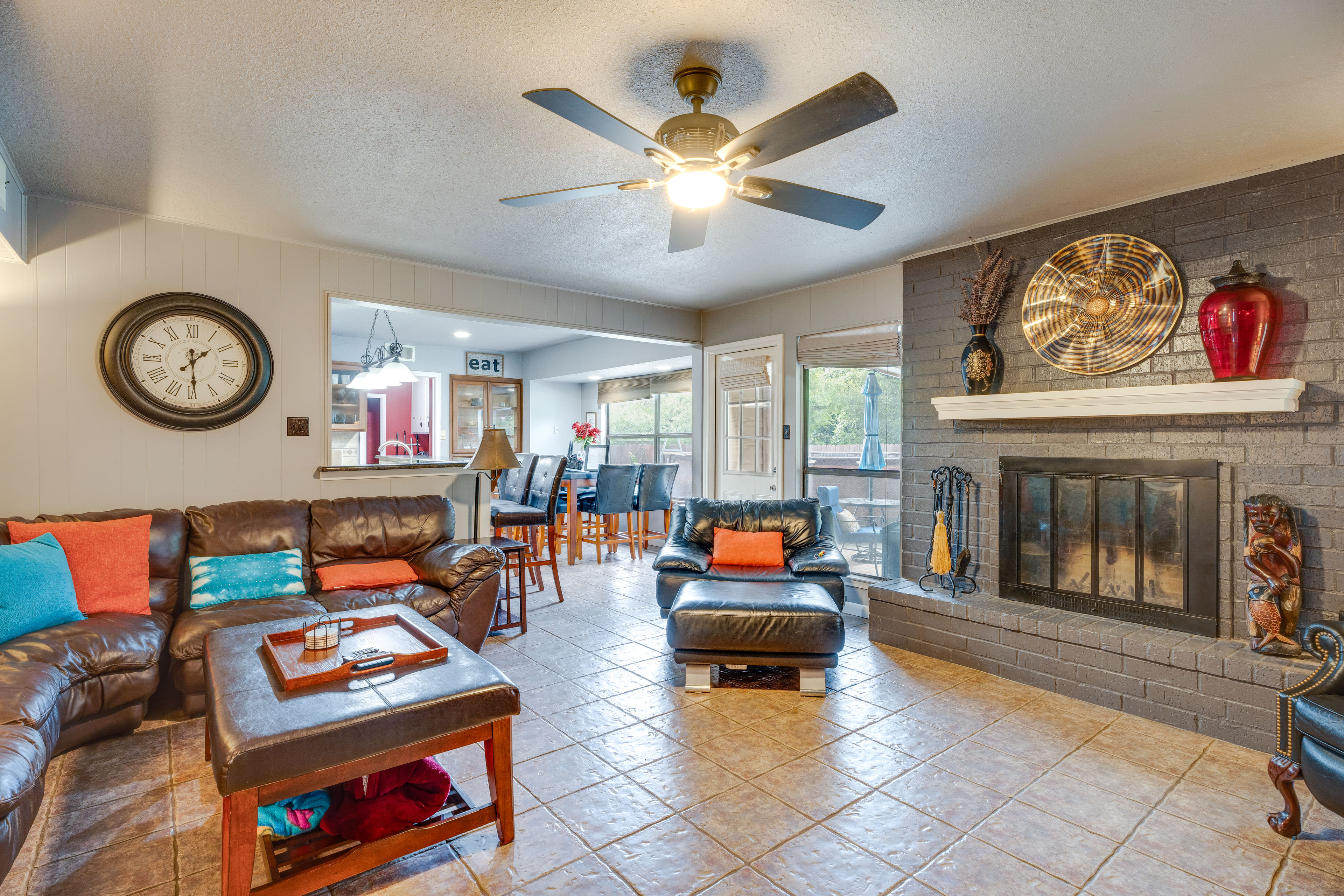 Living Room | Central Air Conditioning + Heating | Smart TVs | Fireplace