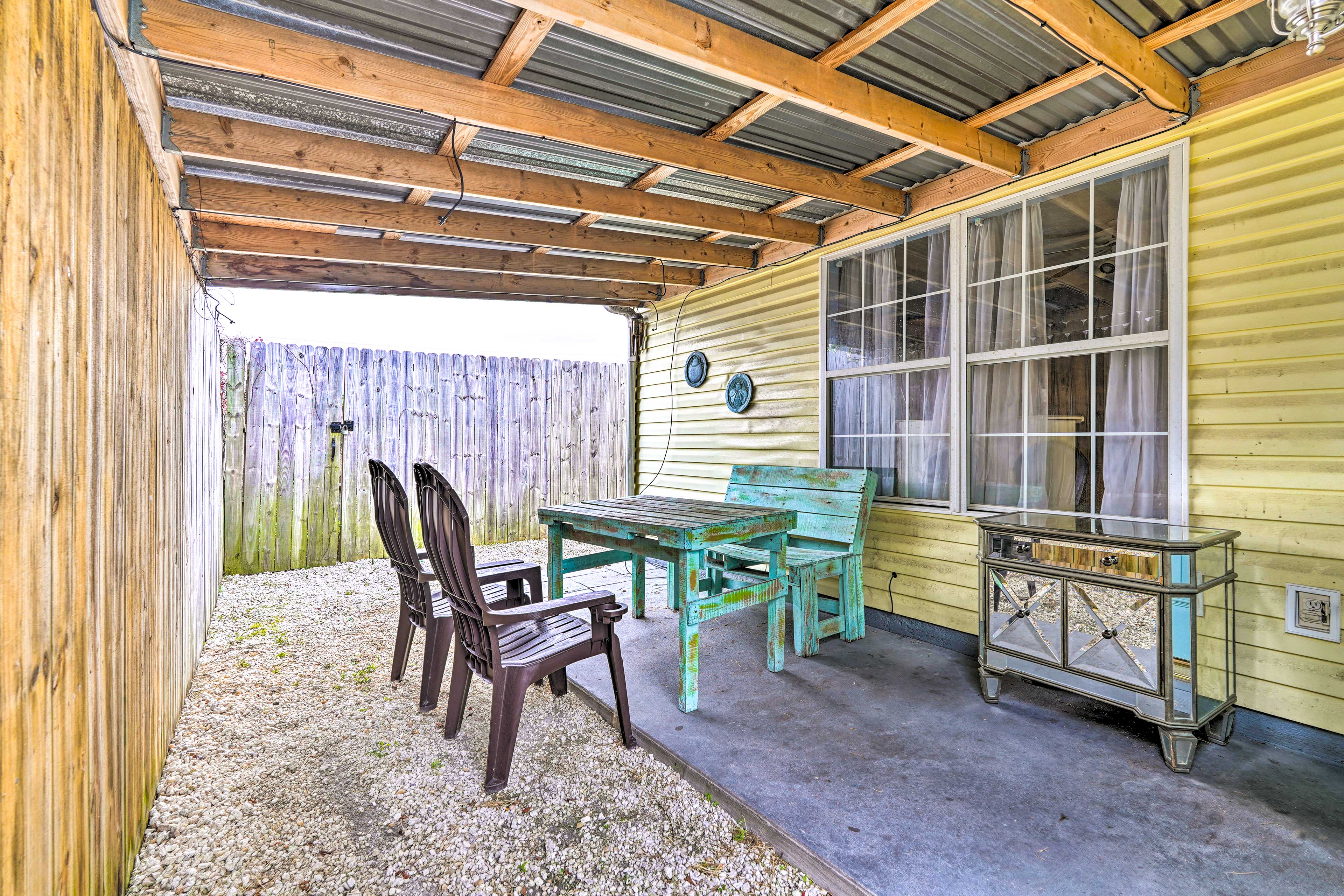 Covered Patio | Fenced Gravel Yard | Pet Friendly