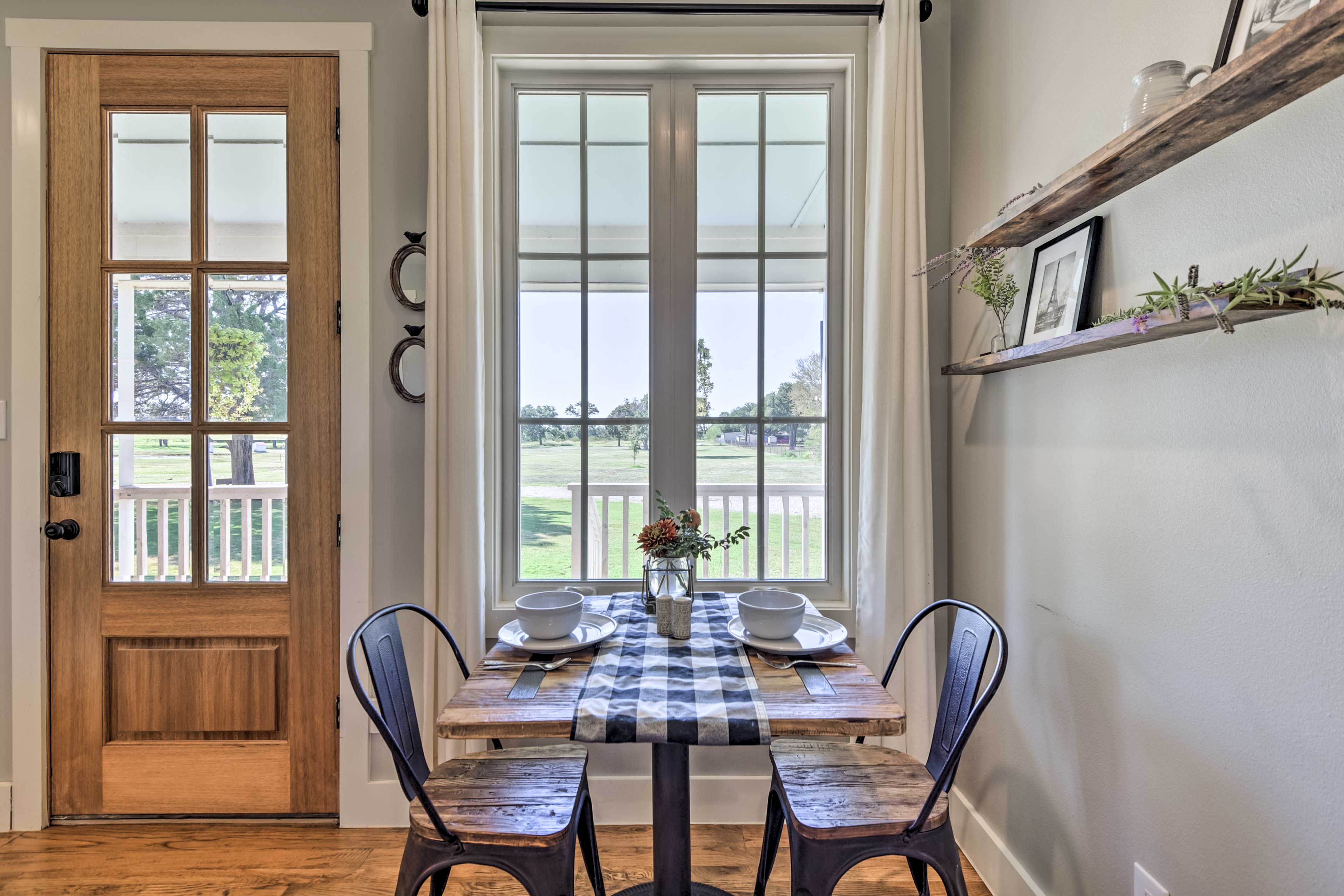 Dining Area | Dishware & Flatware Provided | Breakfast Bar w/ Additional Seating