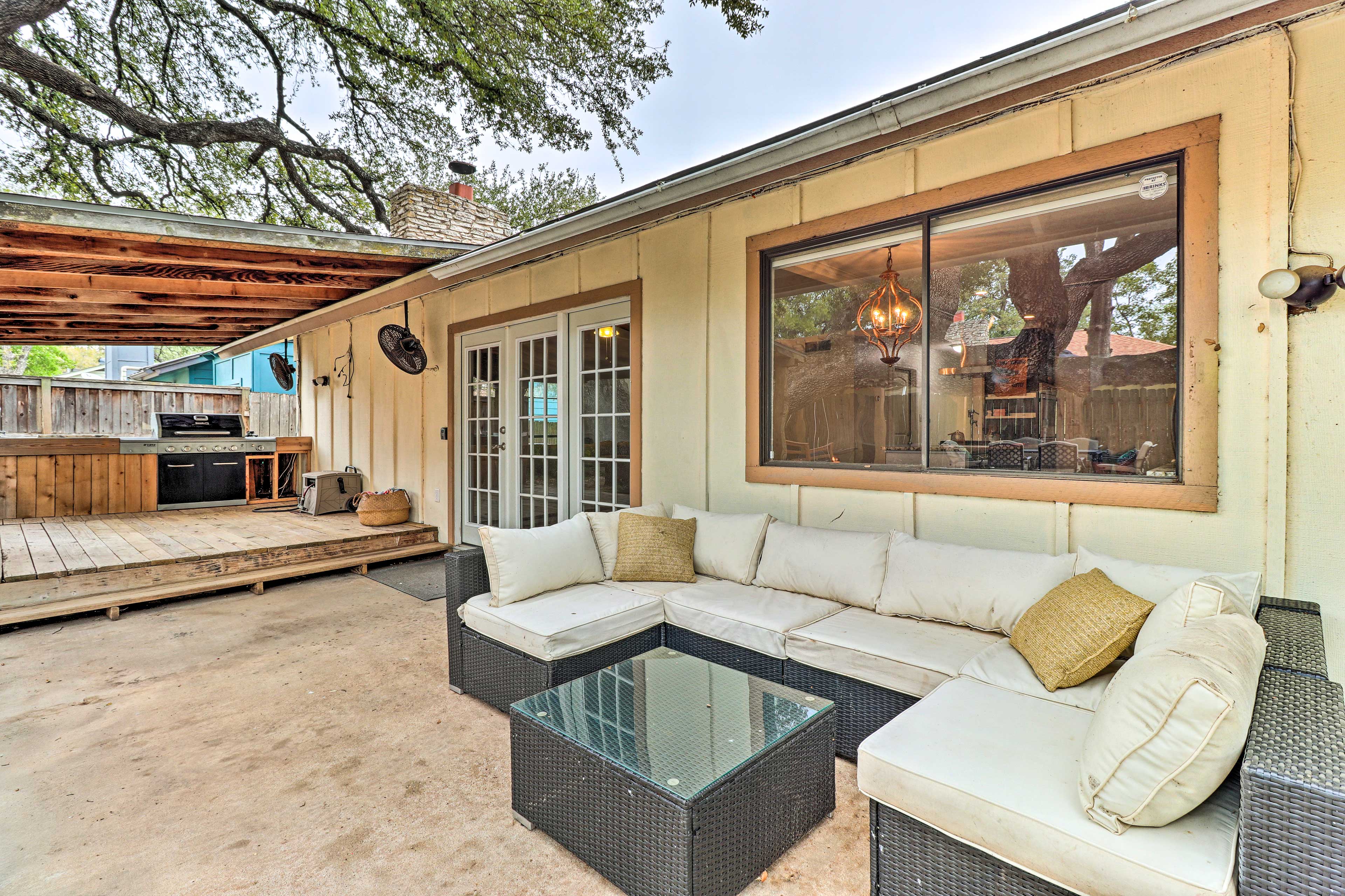 Patio | Outdoor Kitchen | Daybed Swing | Gas Grill | Sitting Area | Dining Area