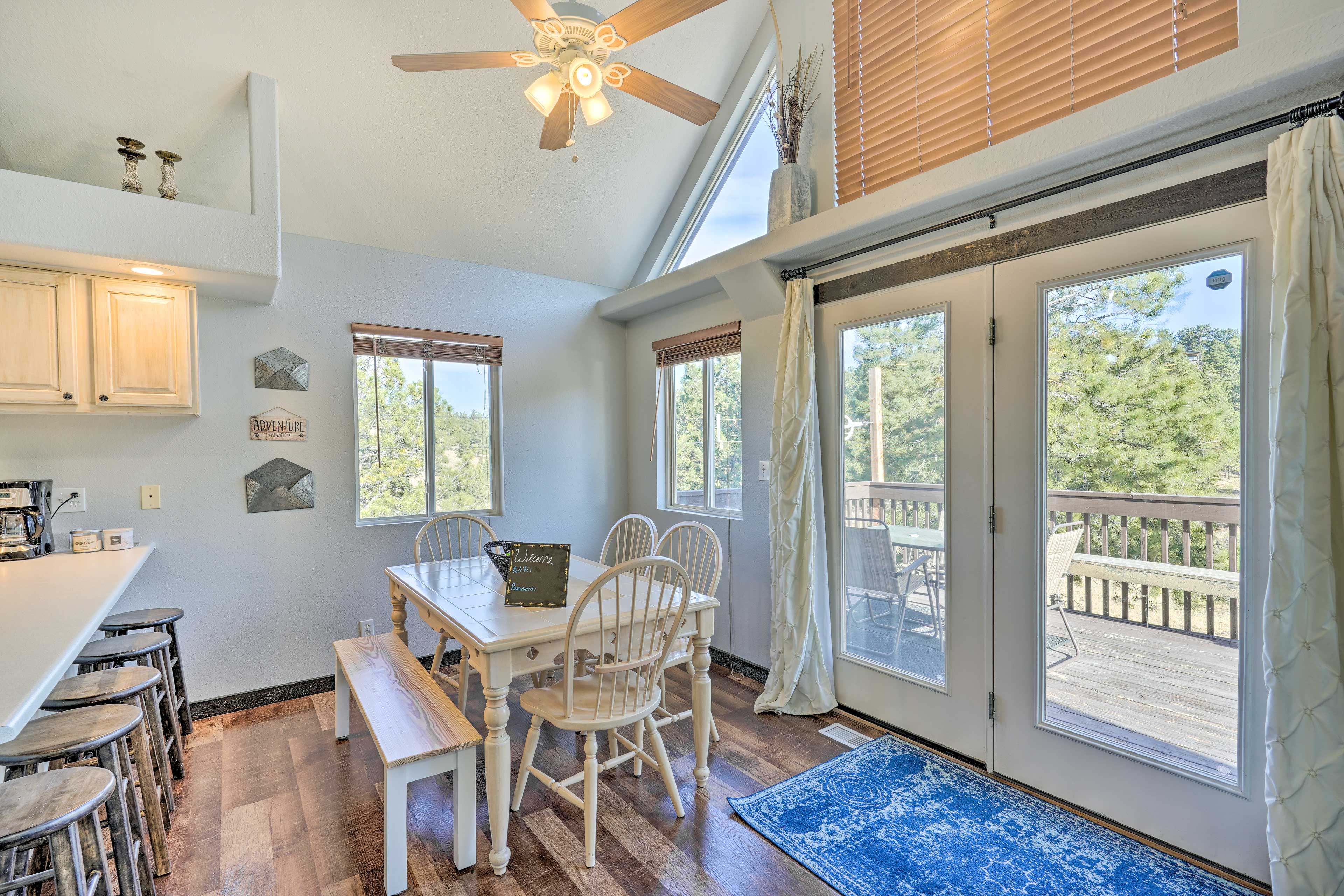 Dining Area | Dishware & Flatware Provided | Breakfast Bar w/ Additional Seating