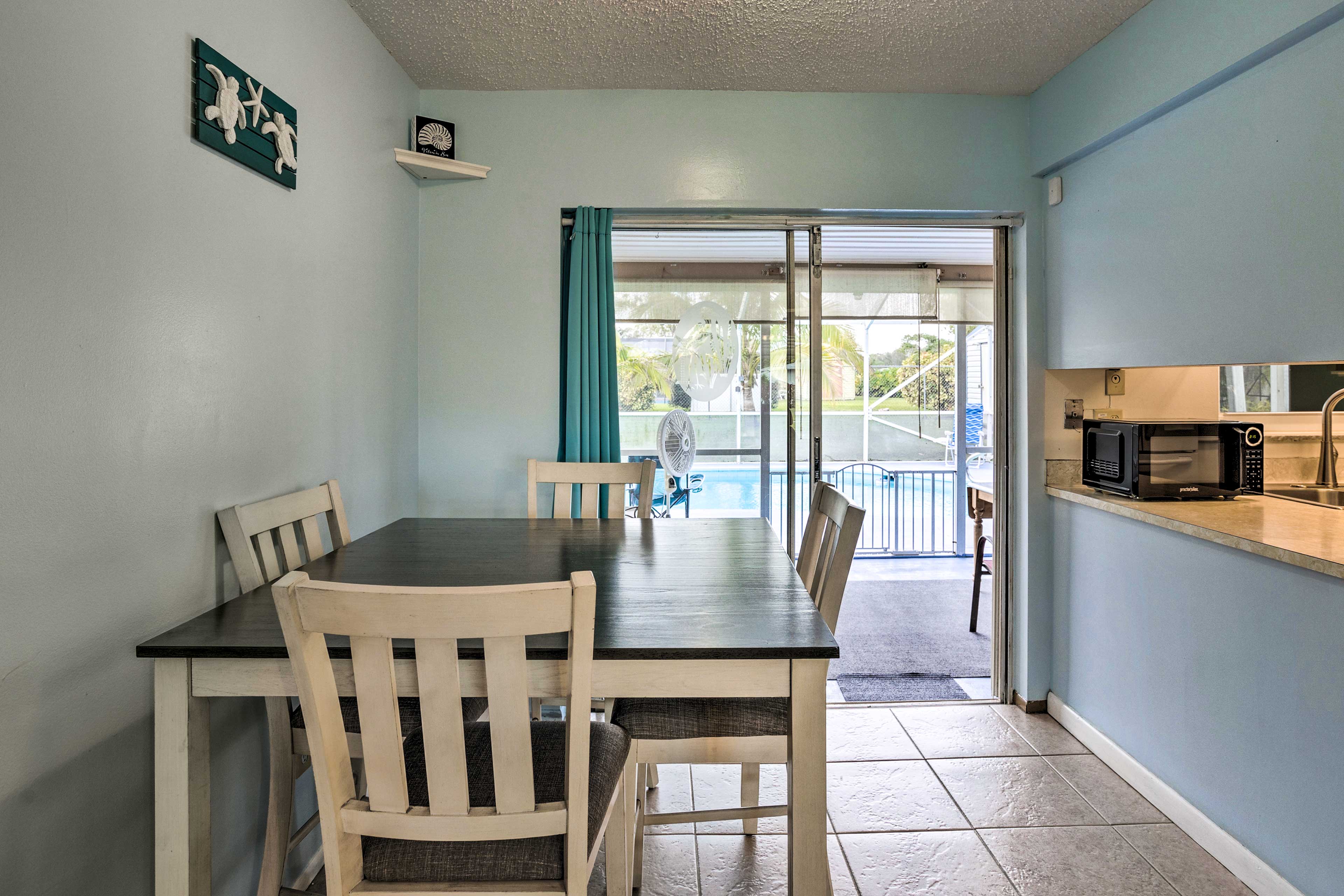 Dining Area | Dining Table | Dishware/Flatware | Patio Access