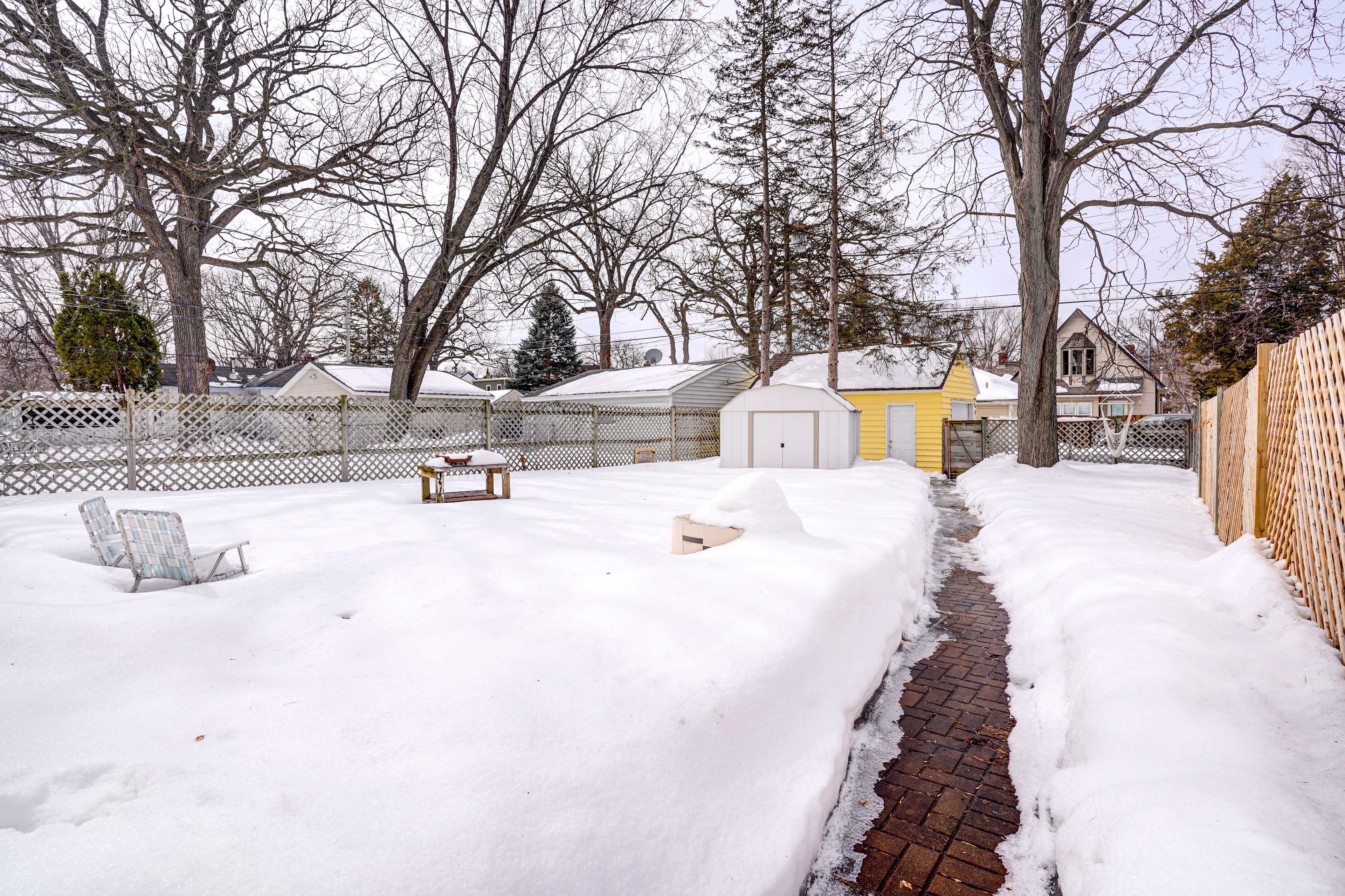 Fenced Backyard | Gas Fire Pit | Lounge Furniture | Hammock Chair