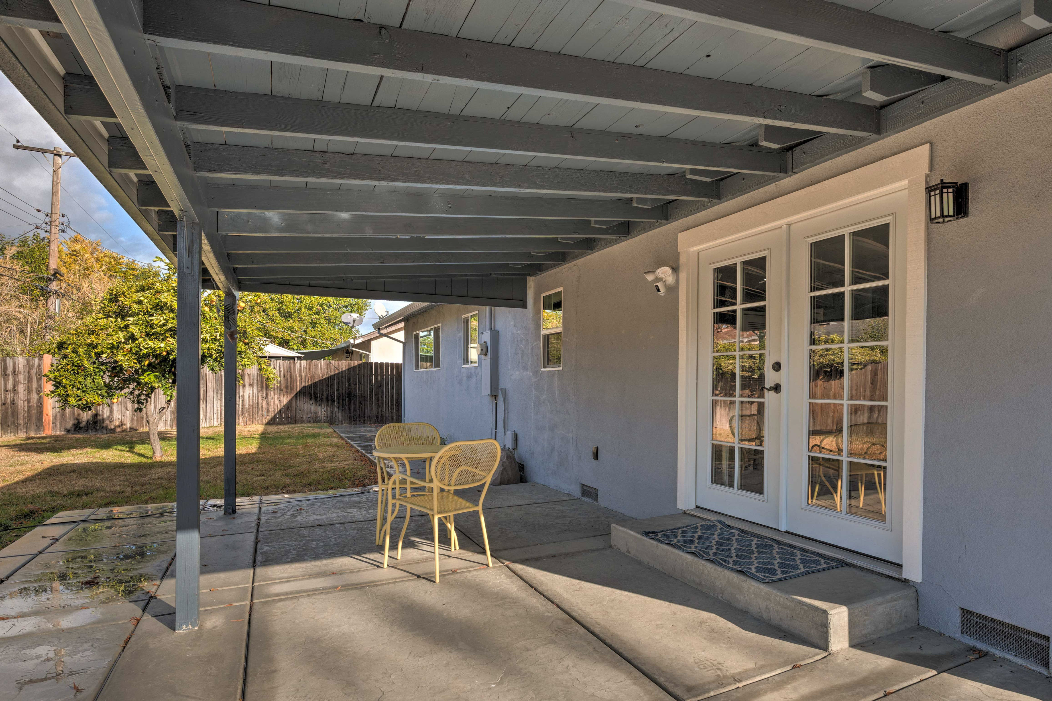 Covered Patio | Fenced-In Yard | Garden | Orange Tree