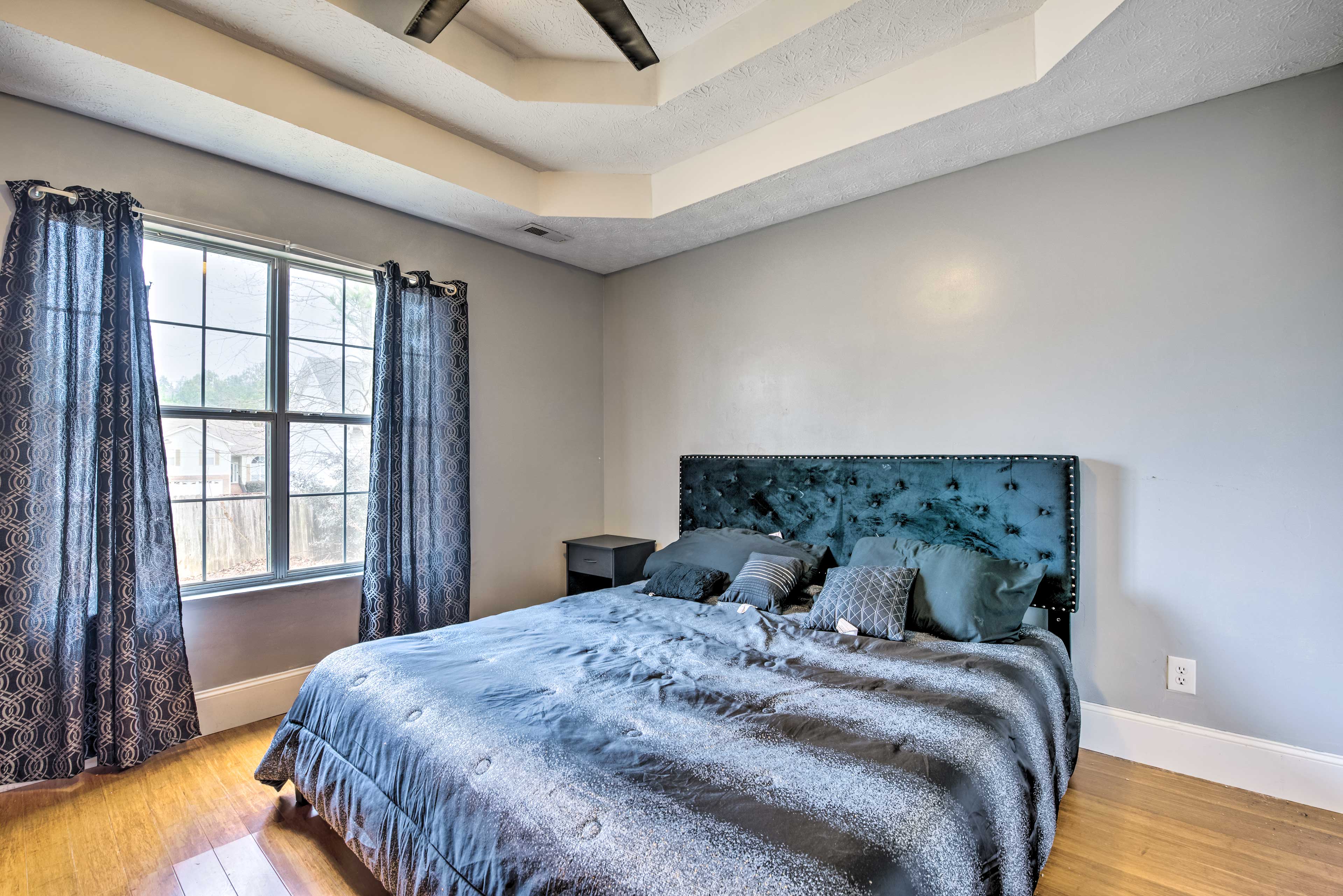 Bedroom 1 | California King Bed | 1st Floor |  Linens & Towels | Smart TV