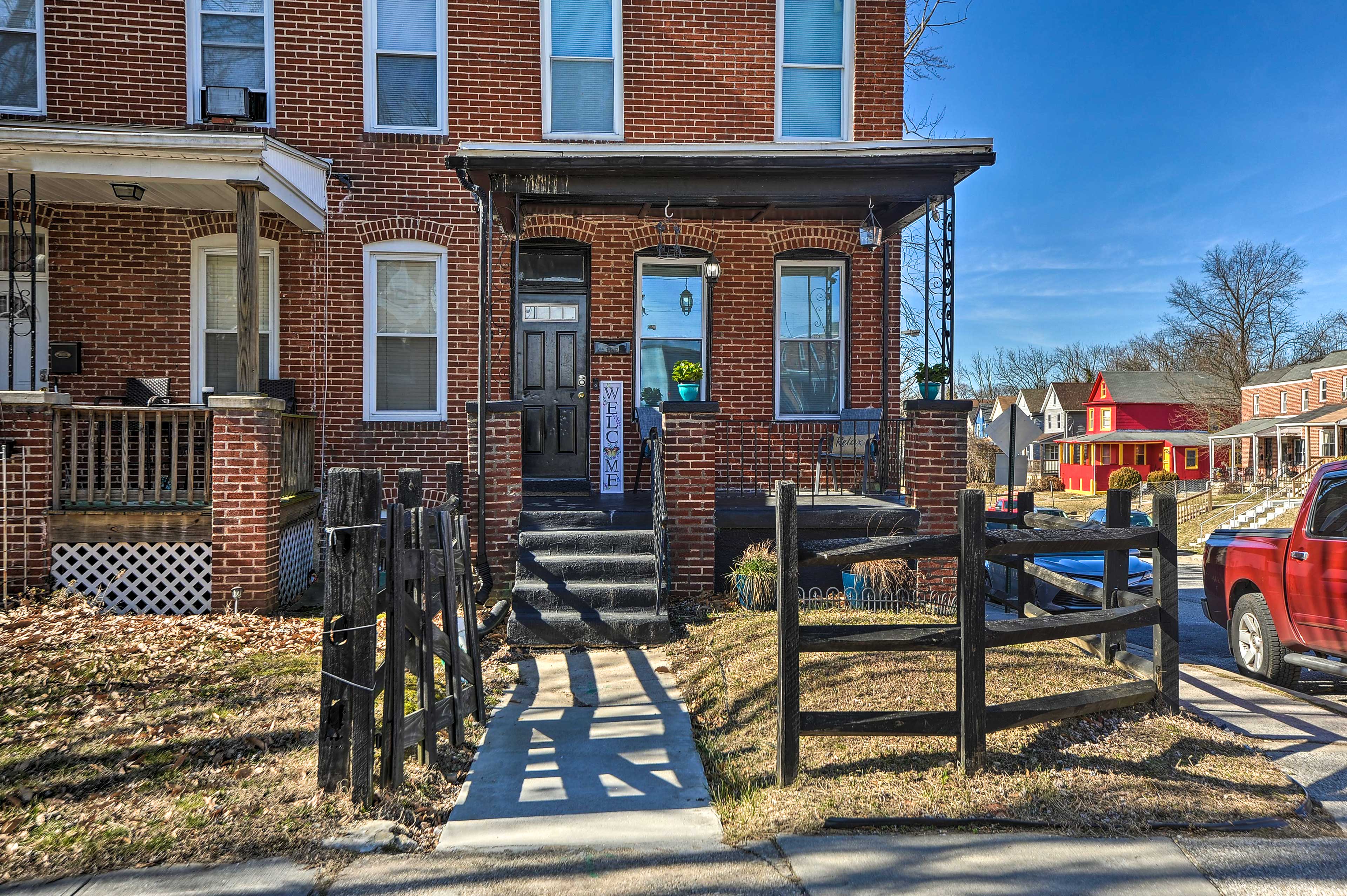 Townhome Exterior | Parking | Covered Parking (1 Vehicle) | Free Street Parking