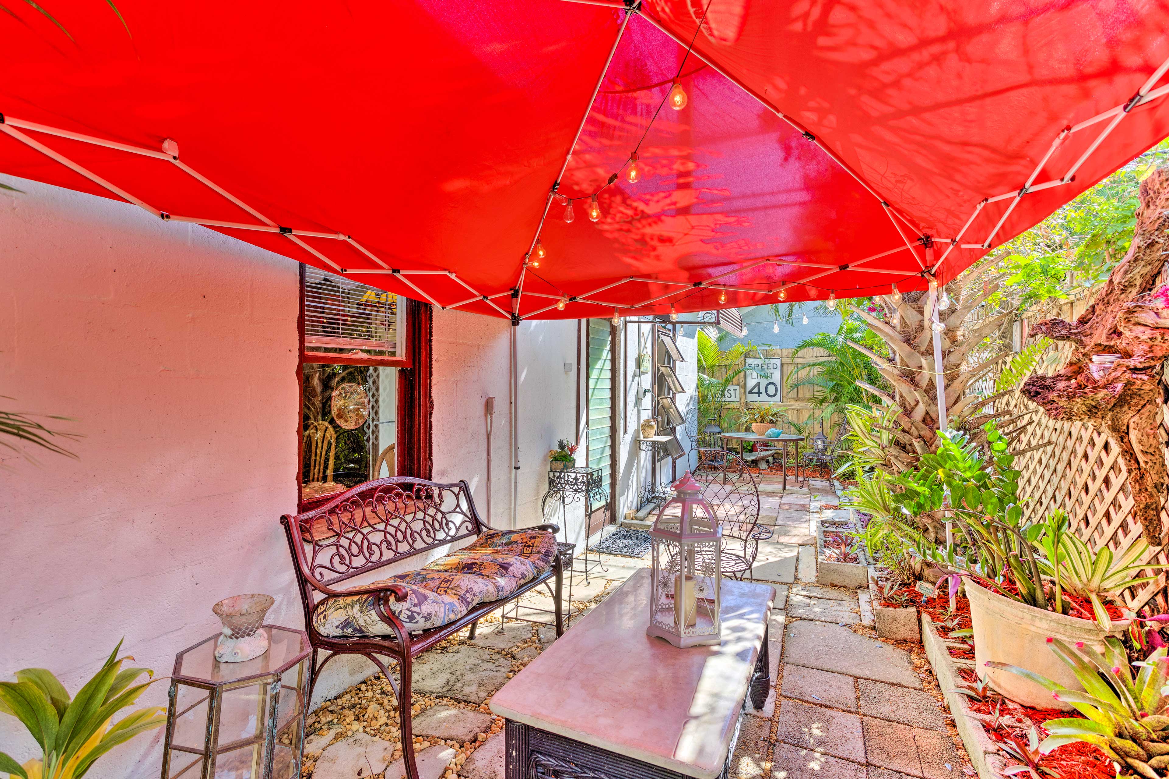 Private Patio | Garden | Outdoor Seating | Sun Umbrella | String Lights
