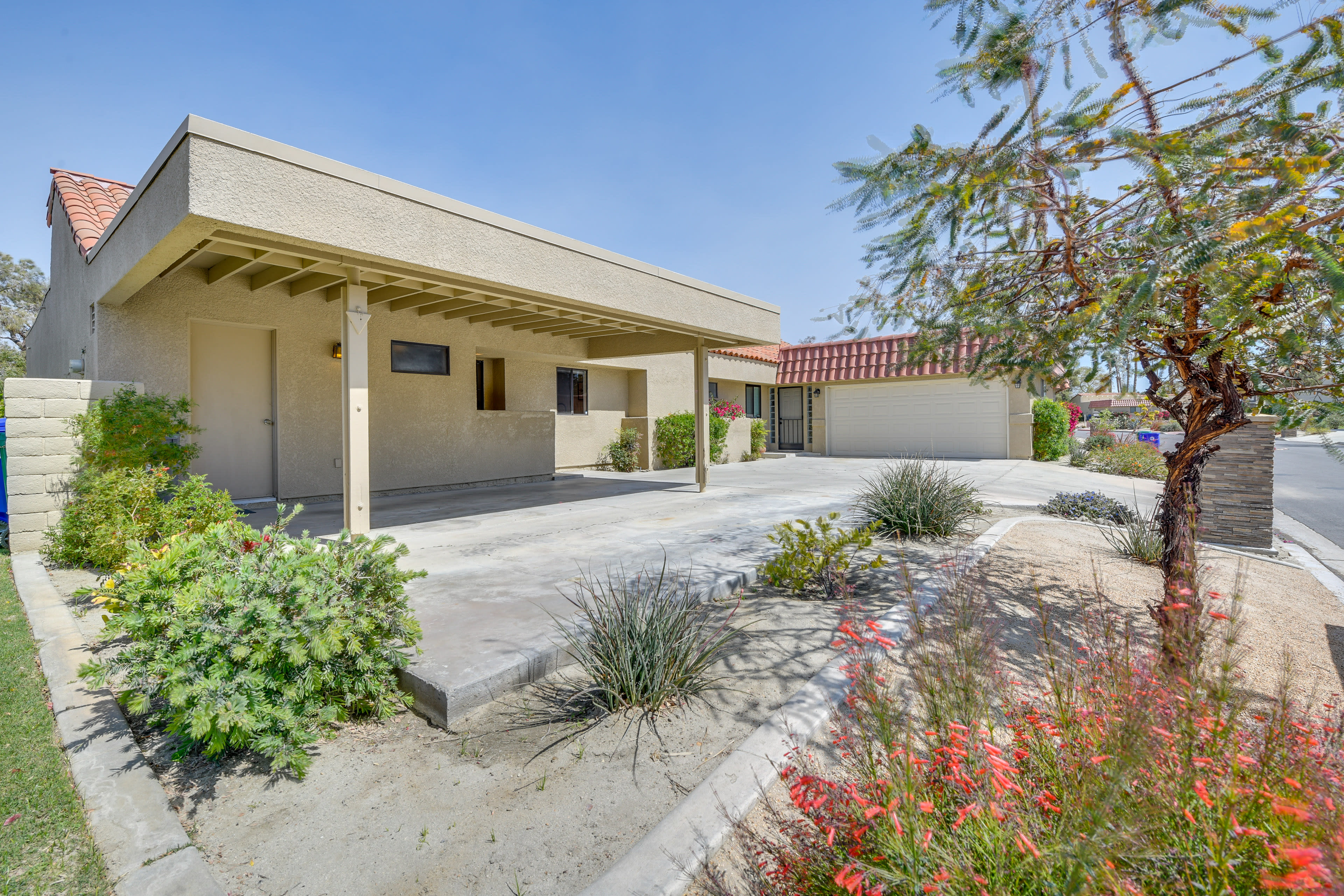 Unit Exterior | Carport (1 Vehicle) | Driveway (1 Vehicle)