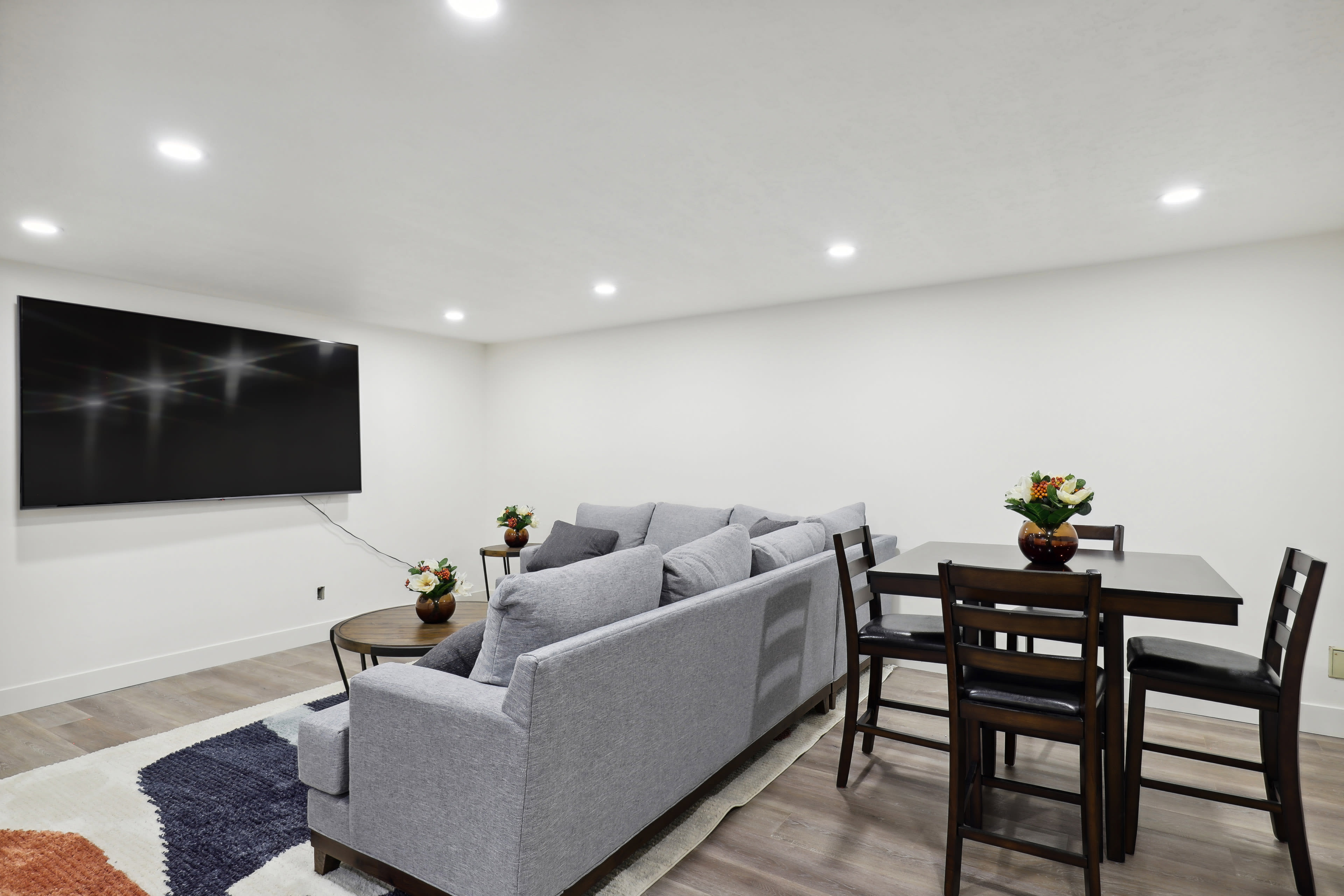 Living Room | Pack 'n Play | Smart TV | Popcorn Machine & Bar