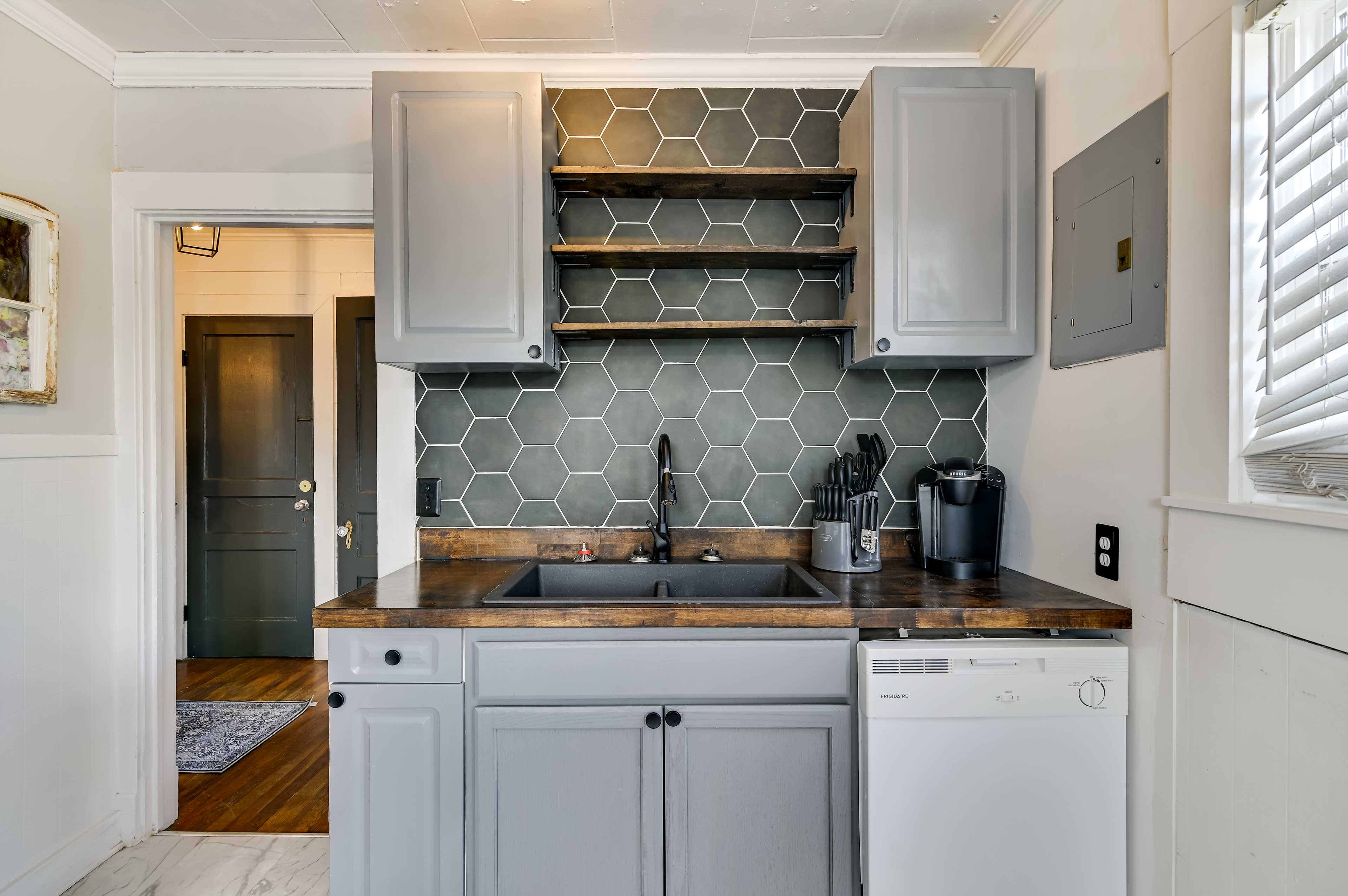 Kitchen | Main Level | Dishwasher | Dishware + Flatware