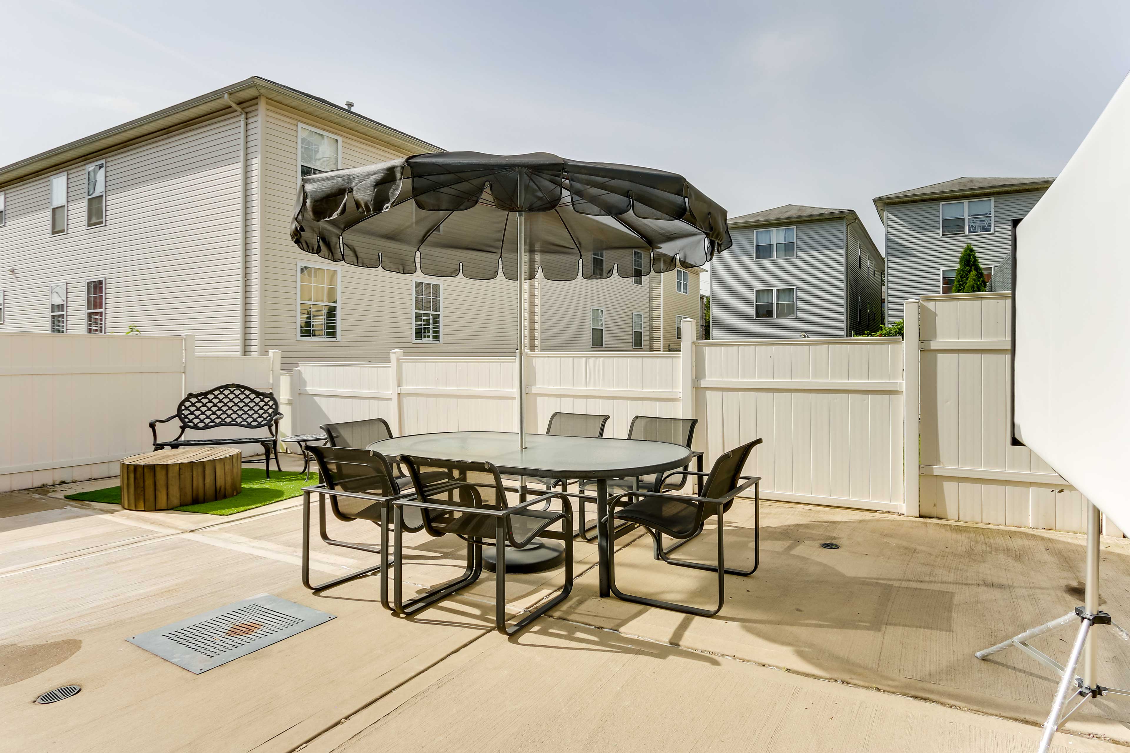 Shared Backyard | Dining Area | Projector Screen