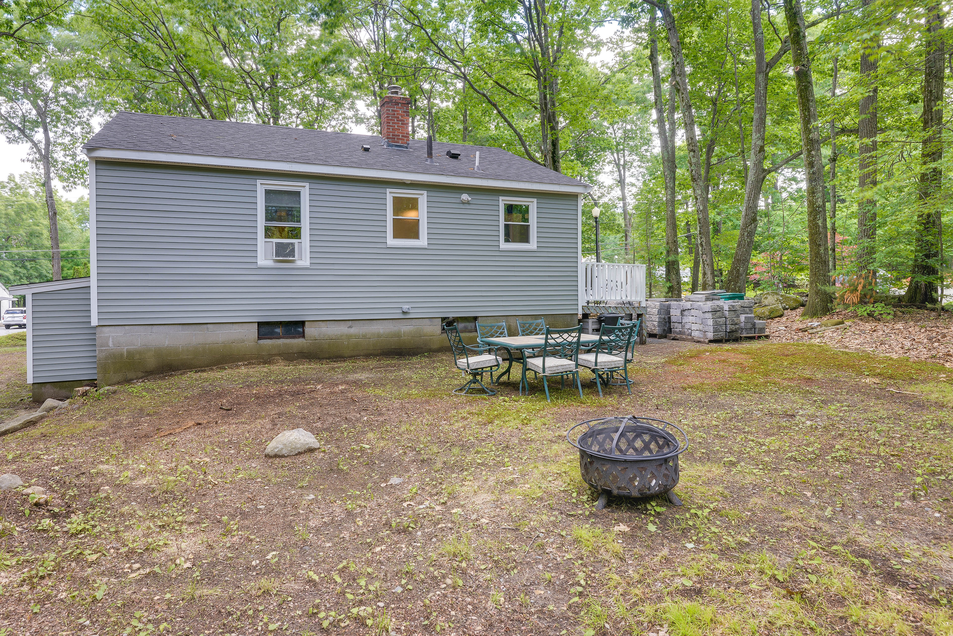 House Exterior | Dining Area | Wood-Burning Fire Pit | Private Yard