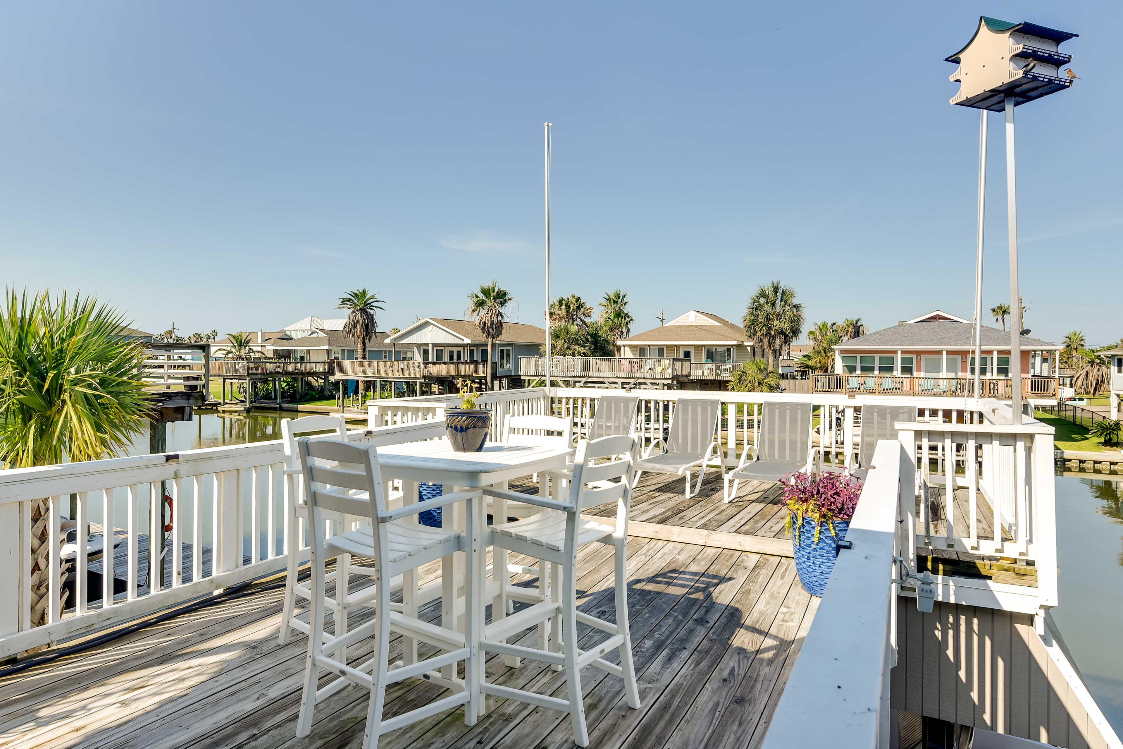 Private Decks | Outdoor Dining Area | Lounge Chairs | Water Views