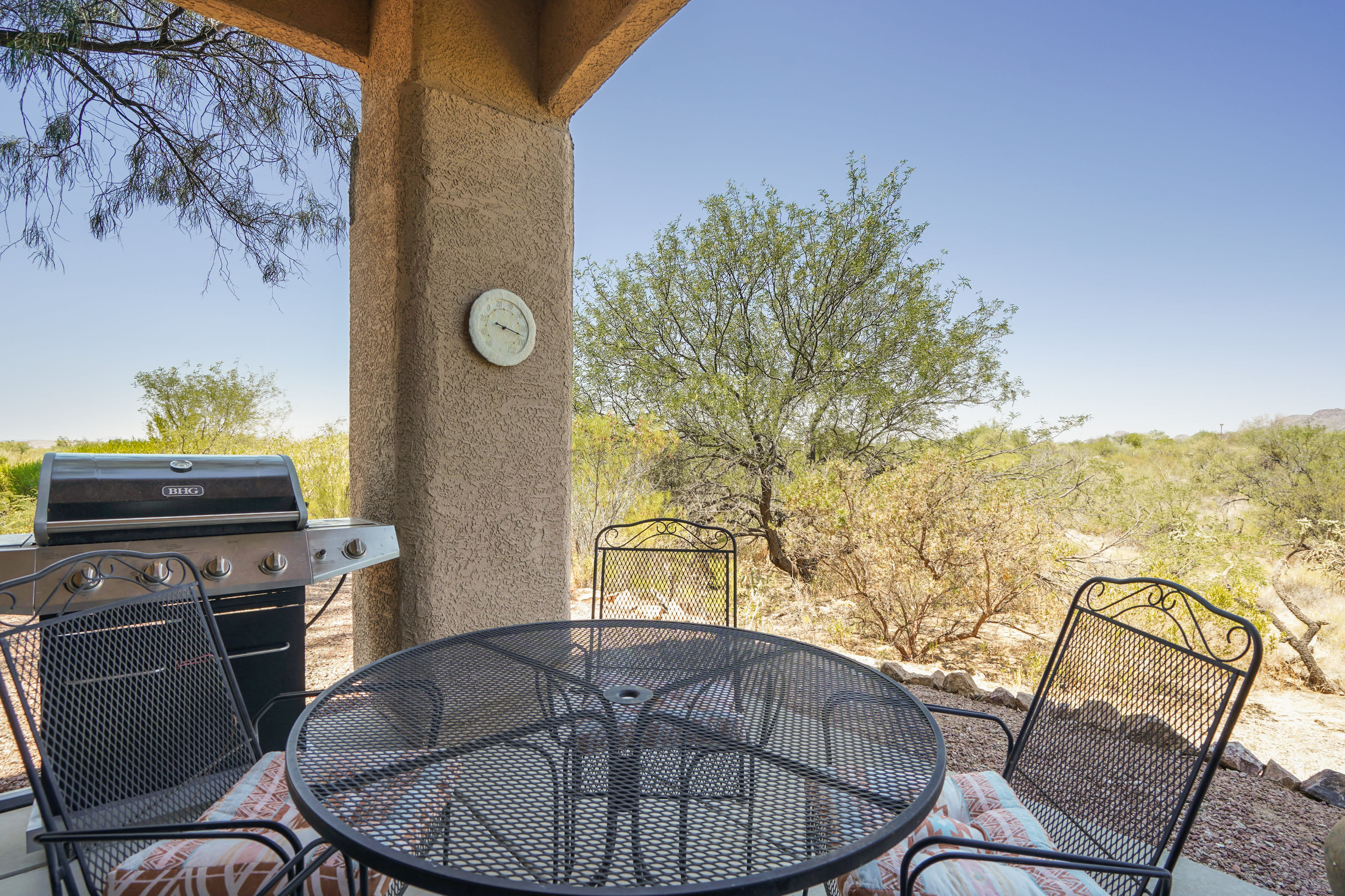 Covered Patio | Gas Grill & Outdoor Dining Area