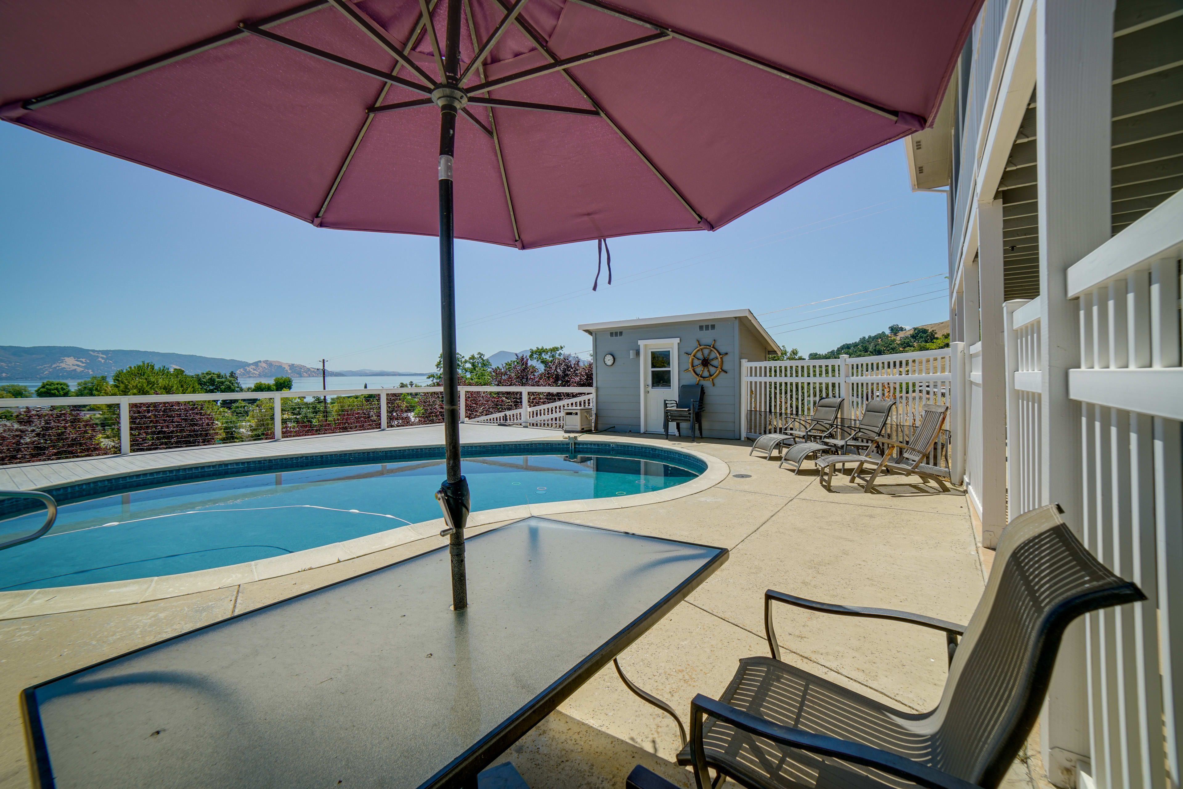 Patio | Outdoor Pool (Depth 3'-7') | Lounge Seating | Outdoor Dining Area