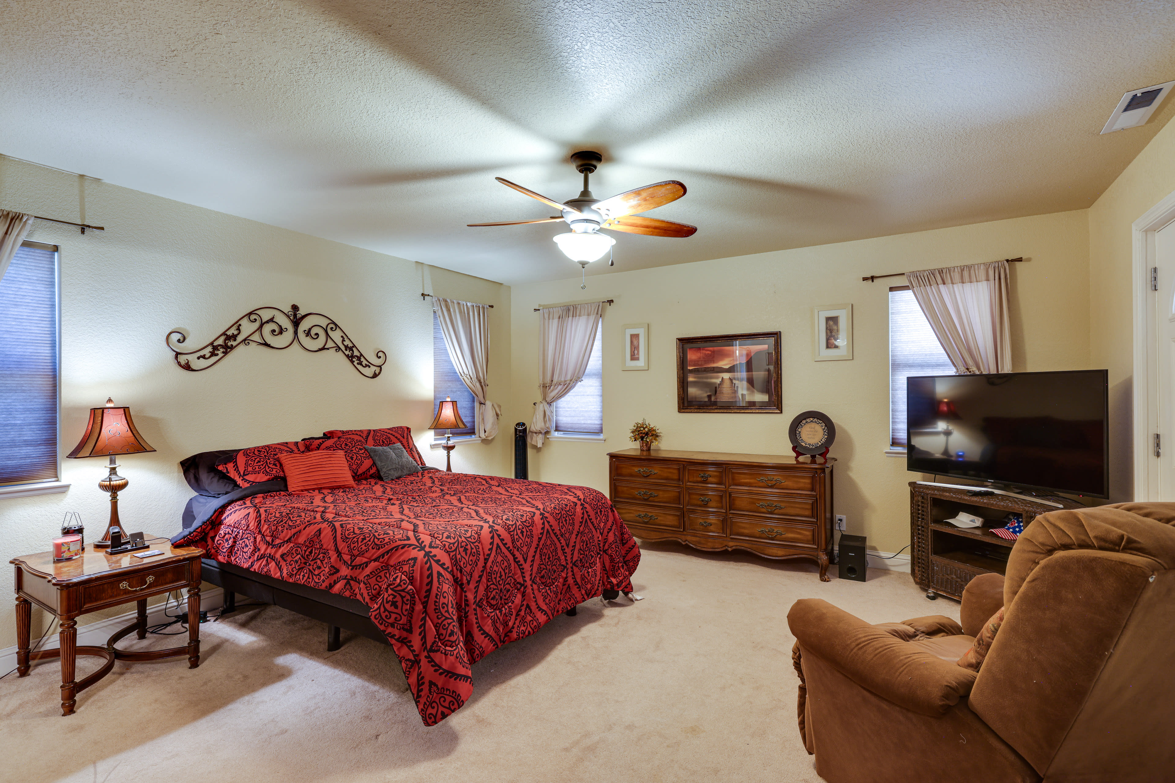 Bedroom 1 | California King Bed | Flat-Screen TV | Linens Provided