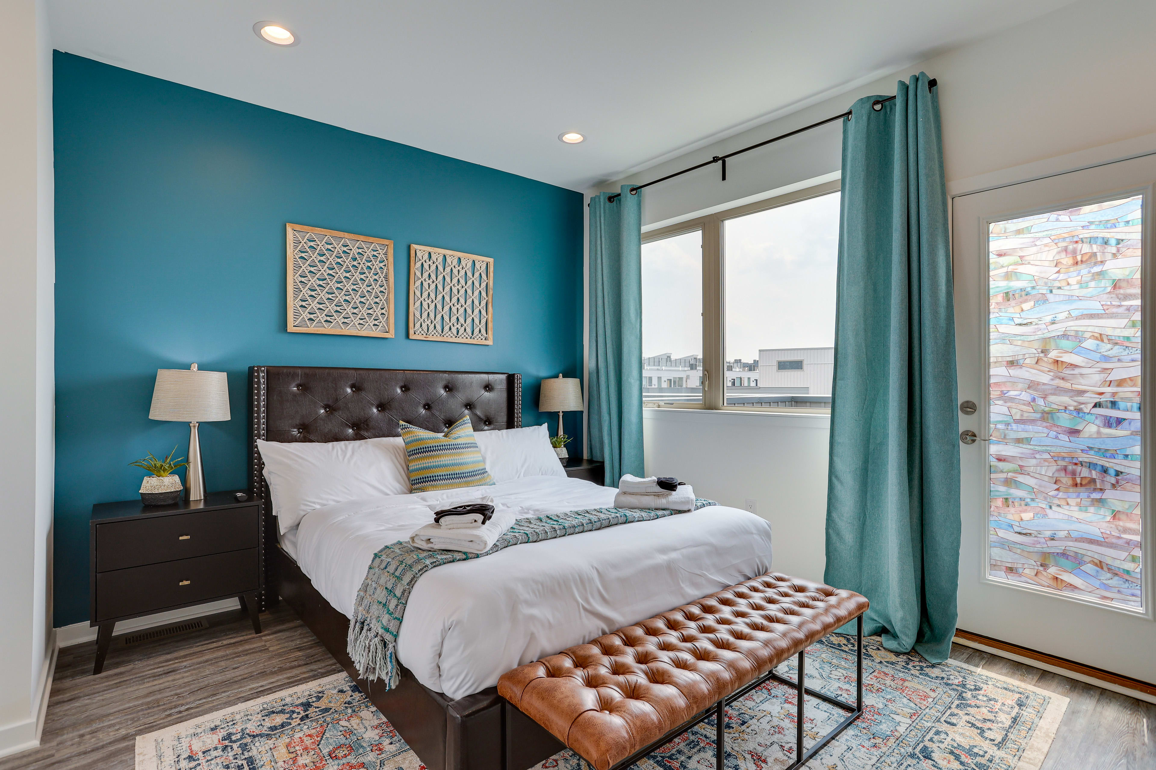 Bedroom 1 | Queen Bed | Smart TV | Rooftop Patio Access | 4th Floor