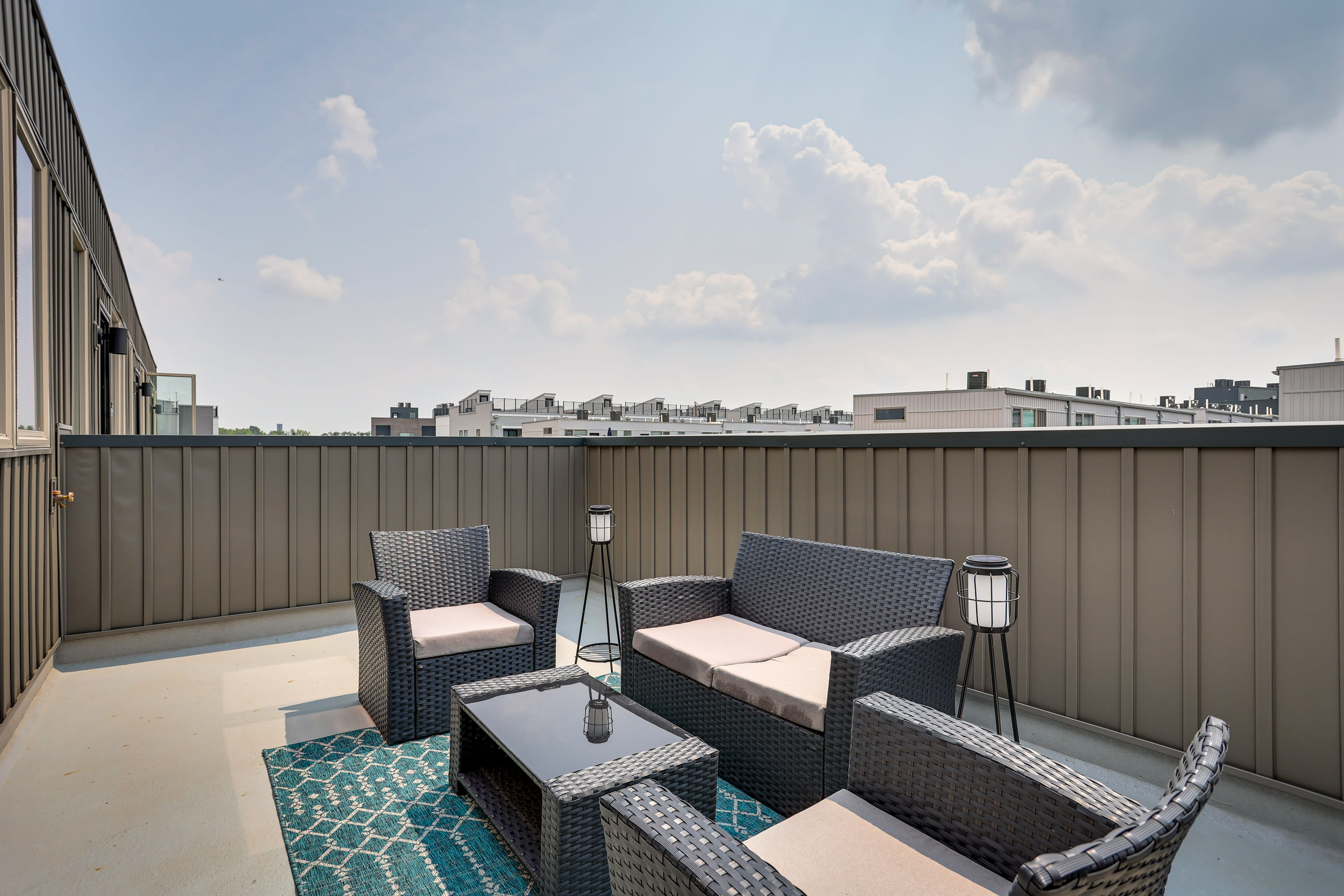 House Exterior | Furnished Rooftop Patio