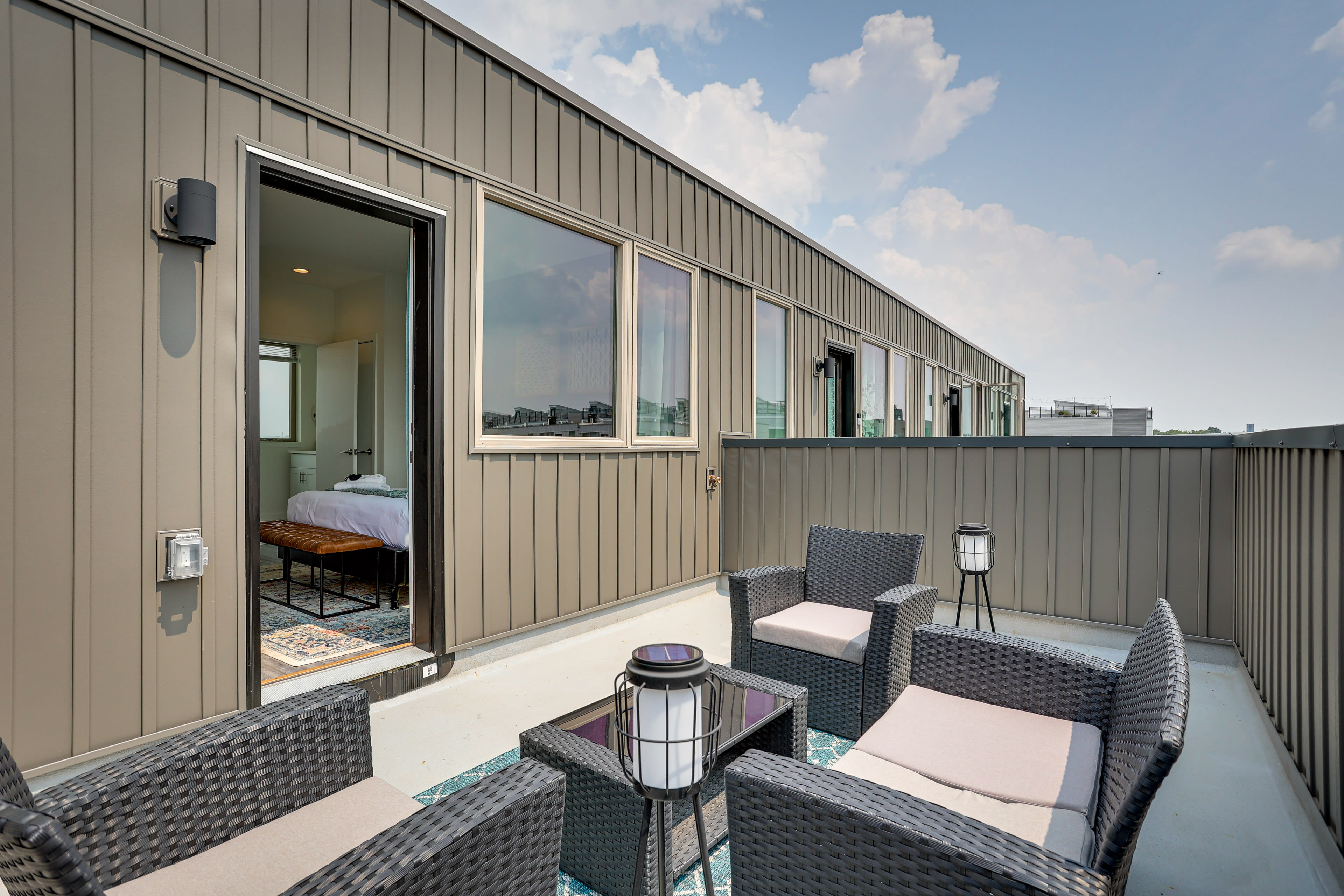 House Exterior | Furnished Rooftop Patio