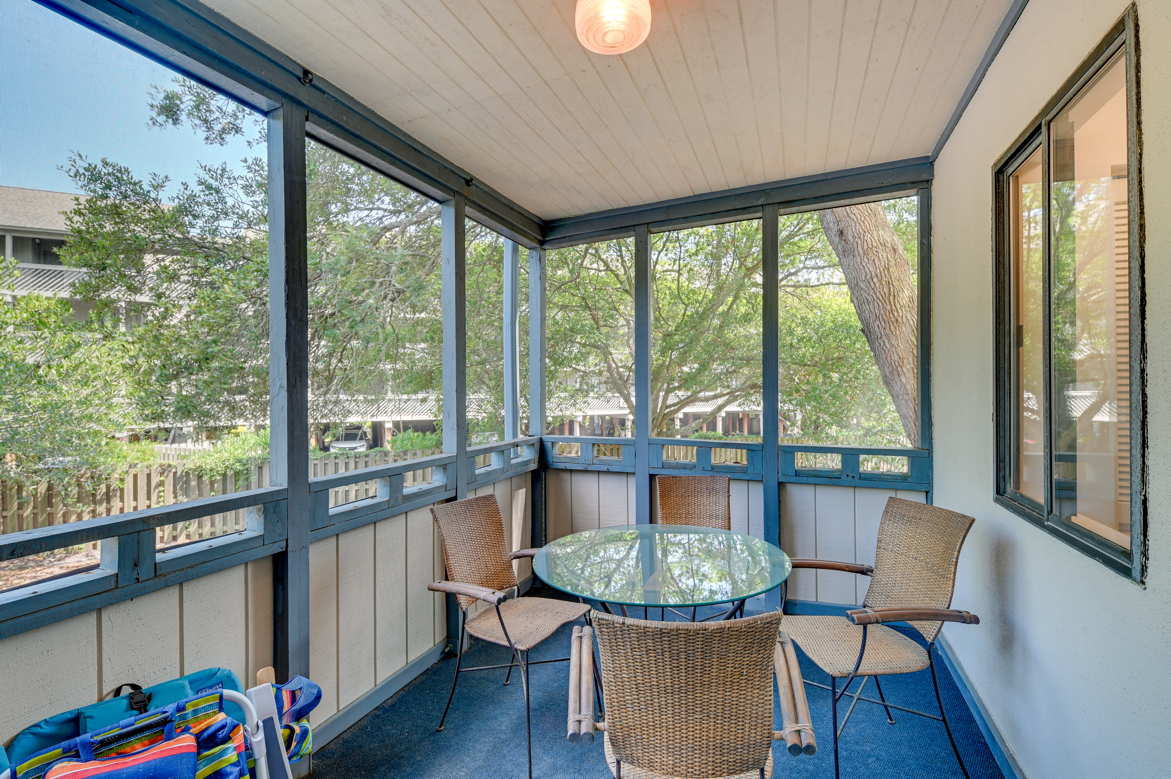 Screened-In Balconies | Private Outdoor Dining Area | Access to Community Pools