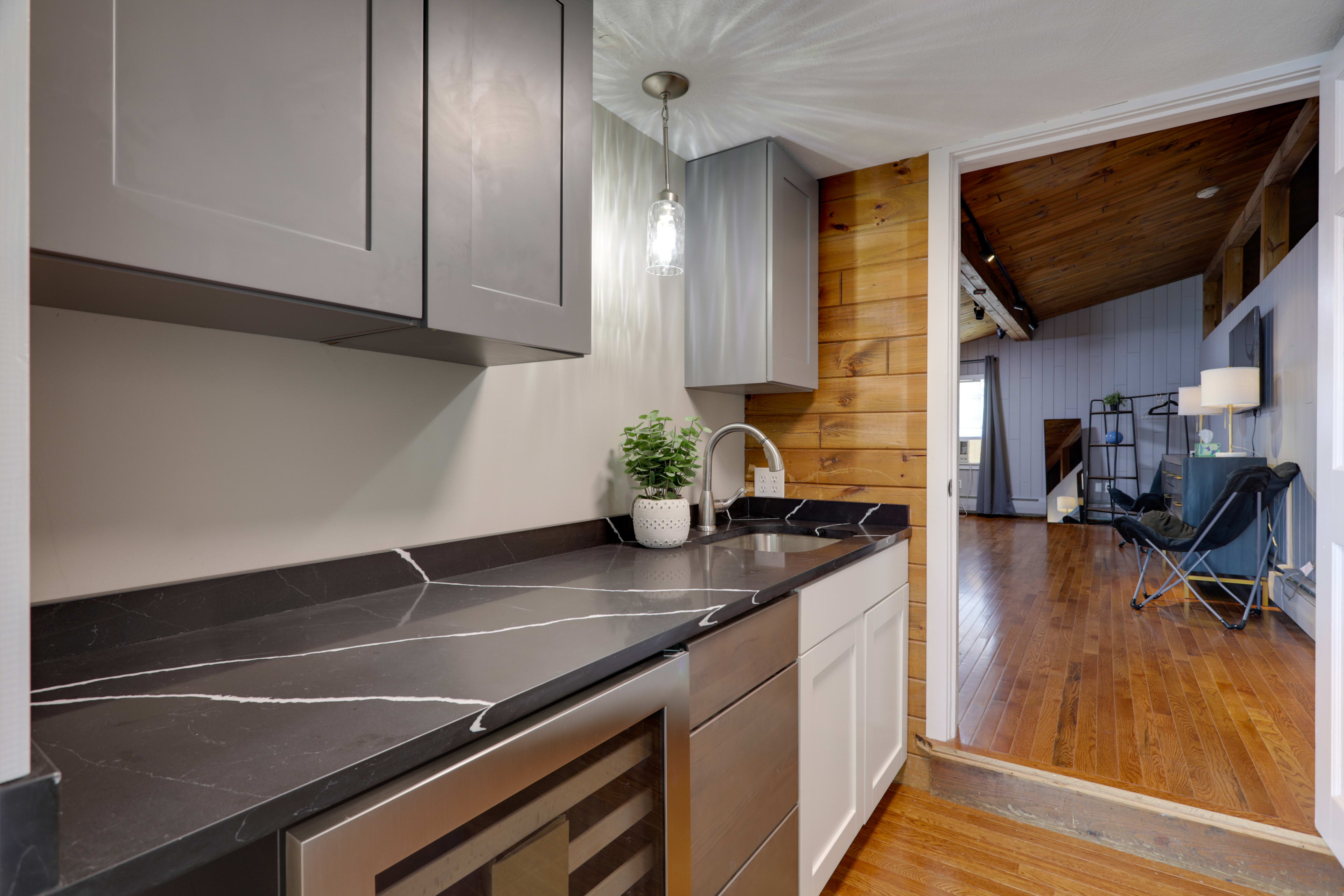 Wet Bar | Wine Cellar | Entrance to Bedroom 5 (1 Addt'l Step to Access)