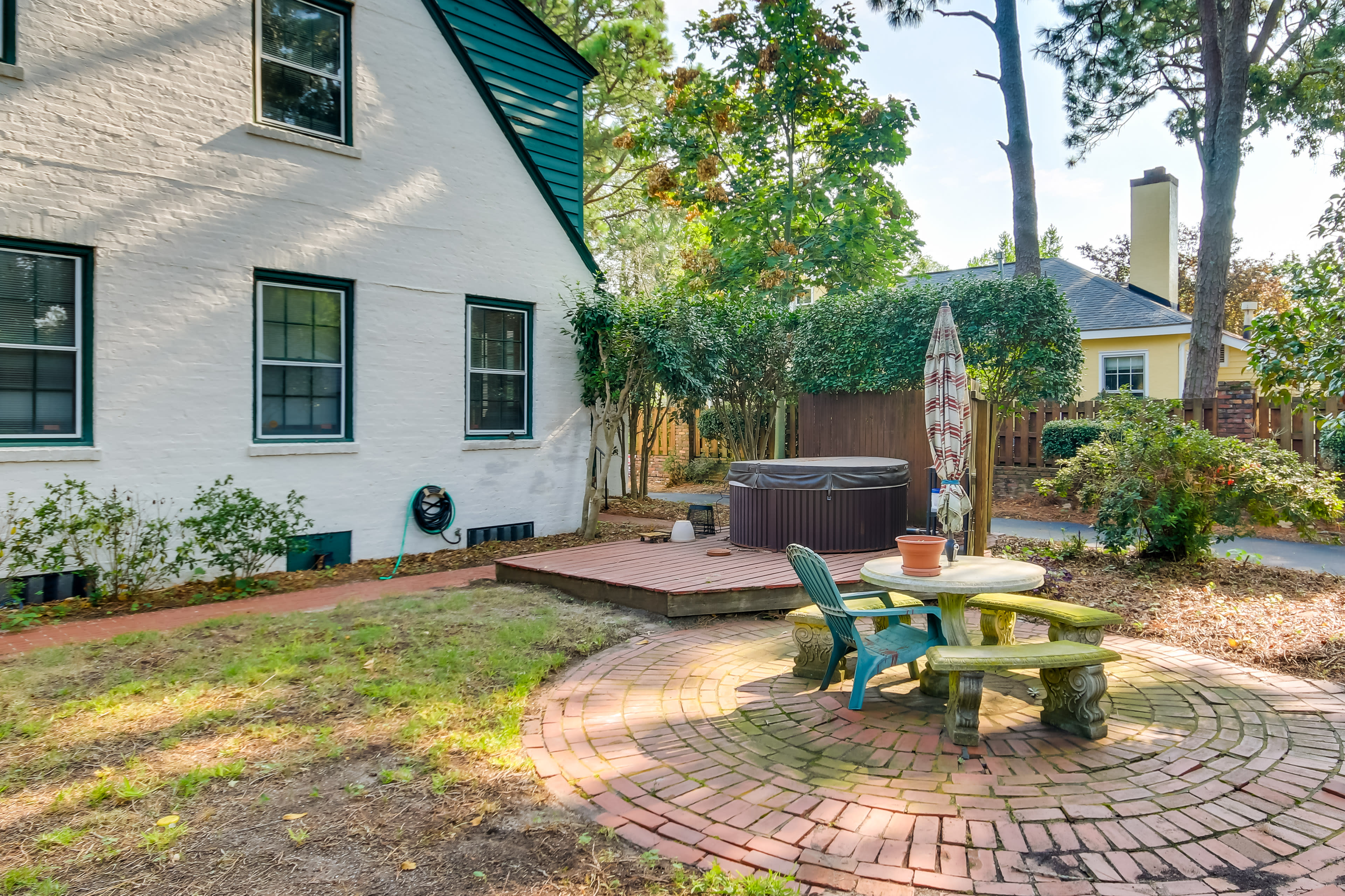 Patio | Dining Area w/ Umbrella | Hot Tub | Fire Pit