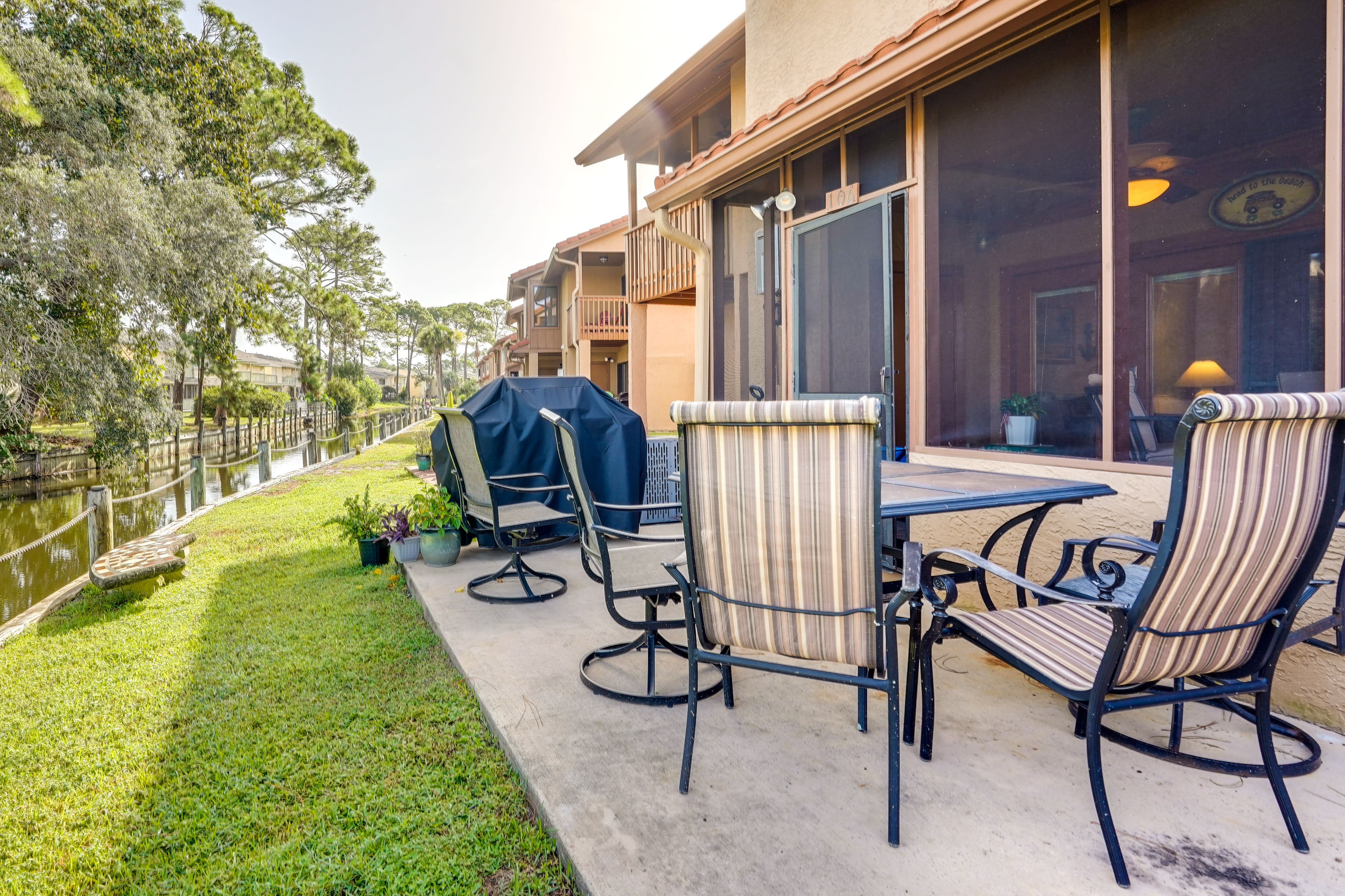 Backyard | Water Views | Outdoor Dining Areas | Screened-In Patio