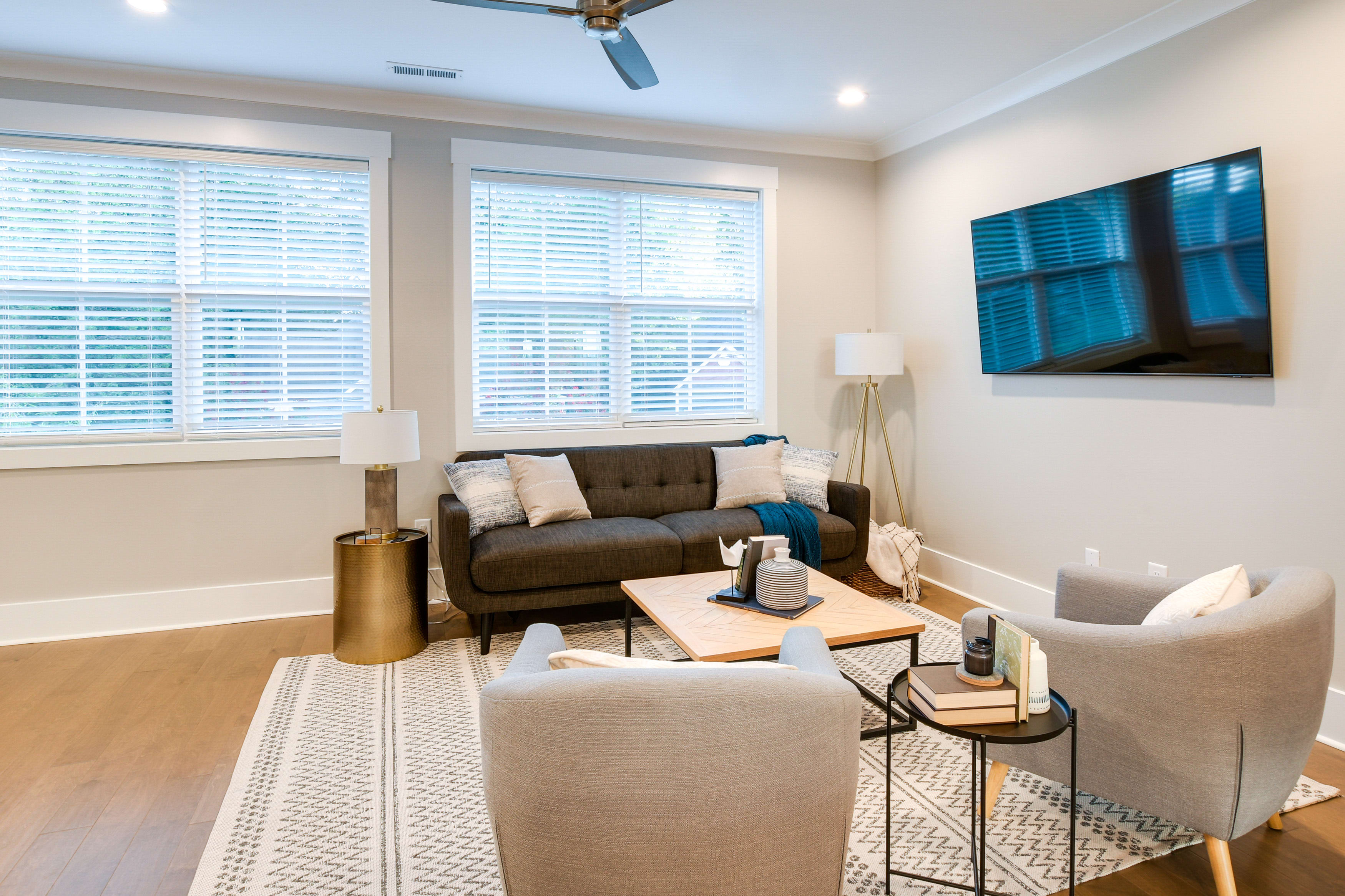 Living Room | Smart TV | Central Heating & A/C | Ceiling Fans | Books