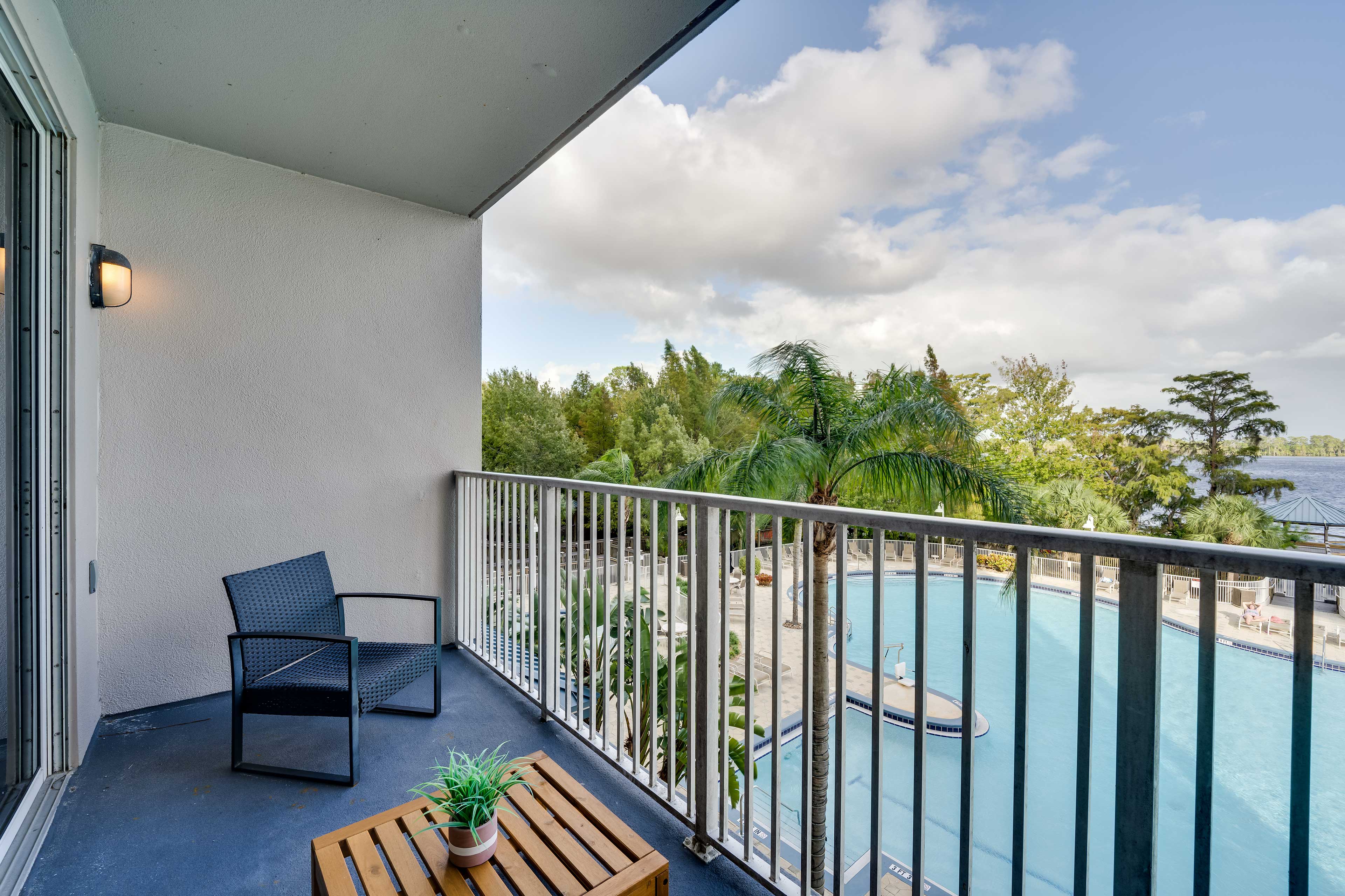 Balcony | Community Pool | Lake Views