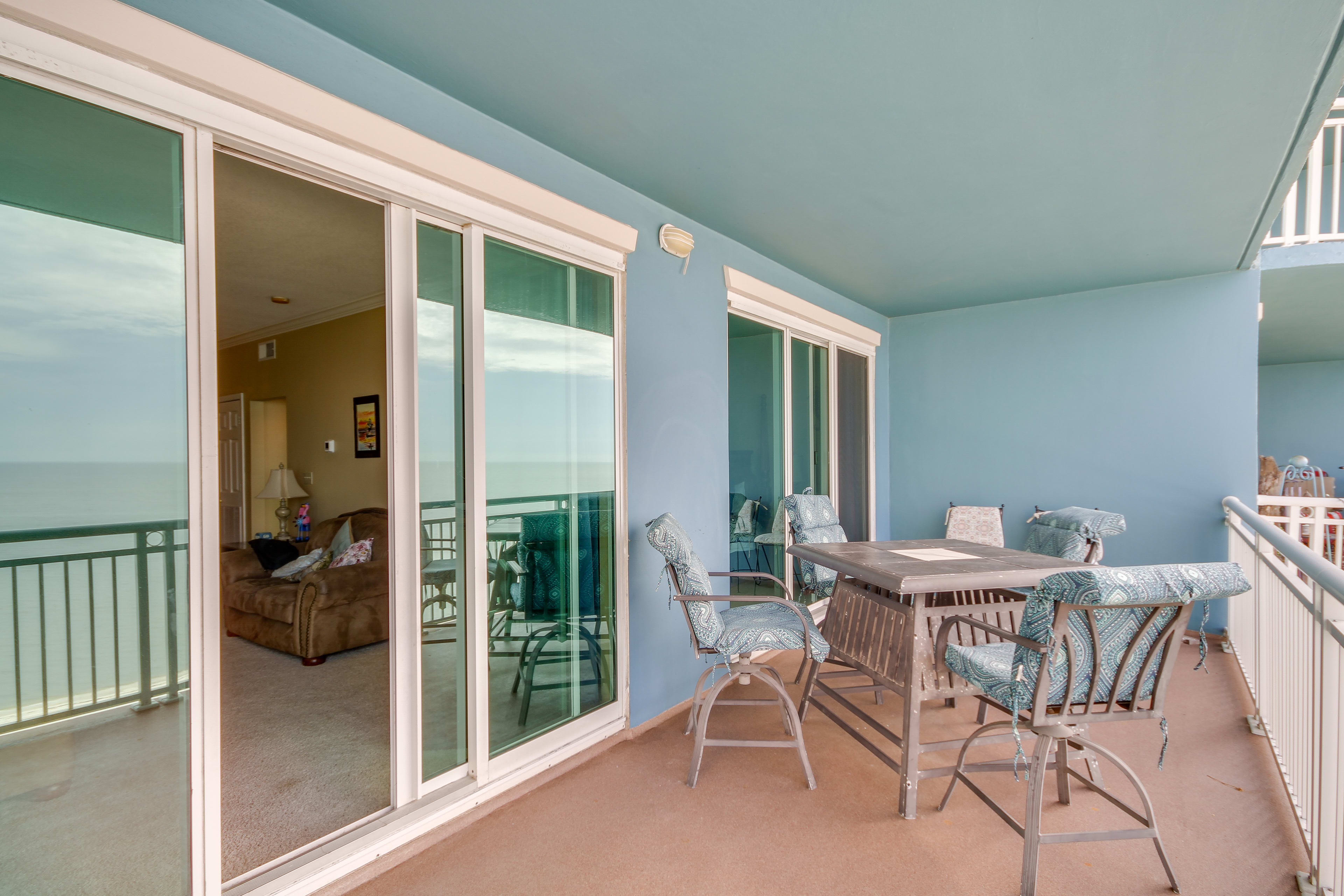 Condo Exterior | Furnished Balcony | Dining Area | Beach & Ocean Views