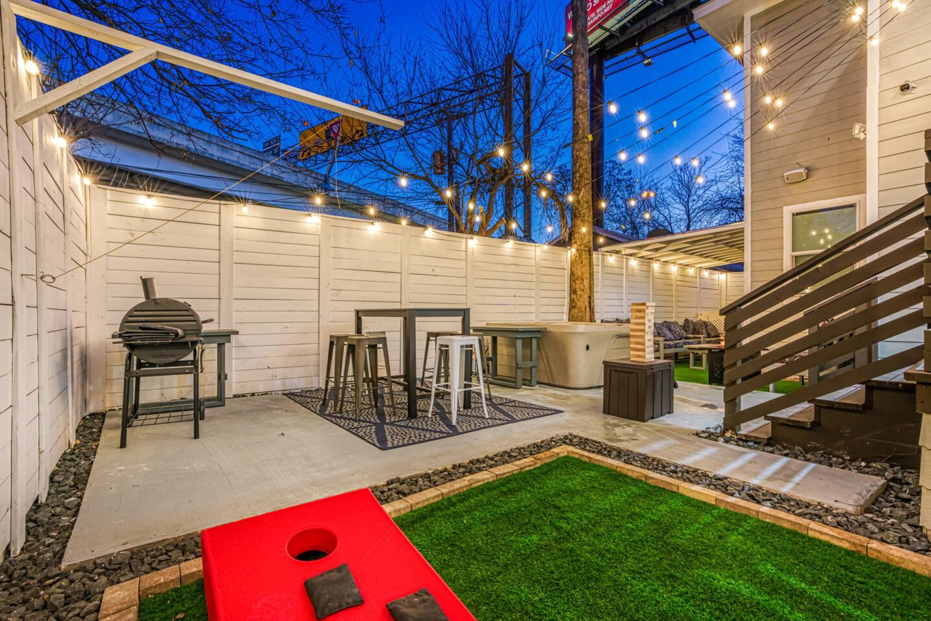 Private Patio | Cornhole Set | Seating | Charcoal Grill | Outdoor Dining Area